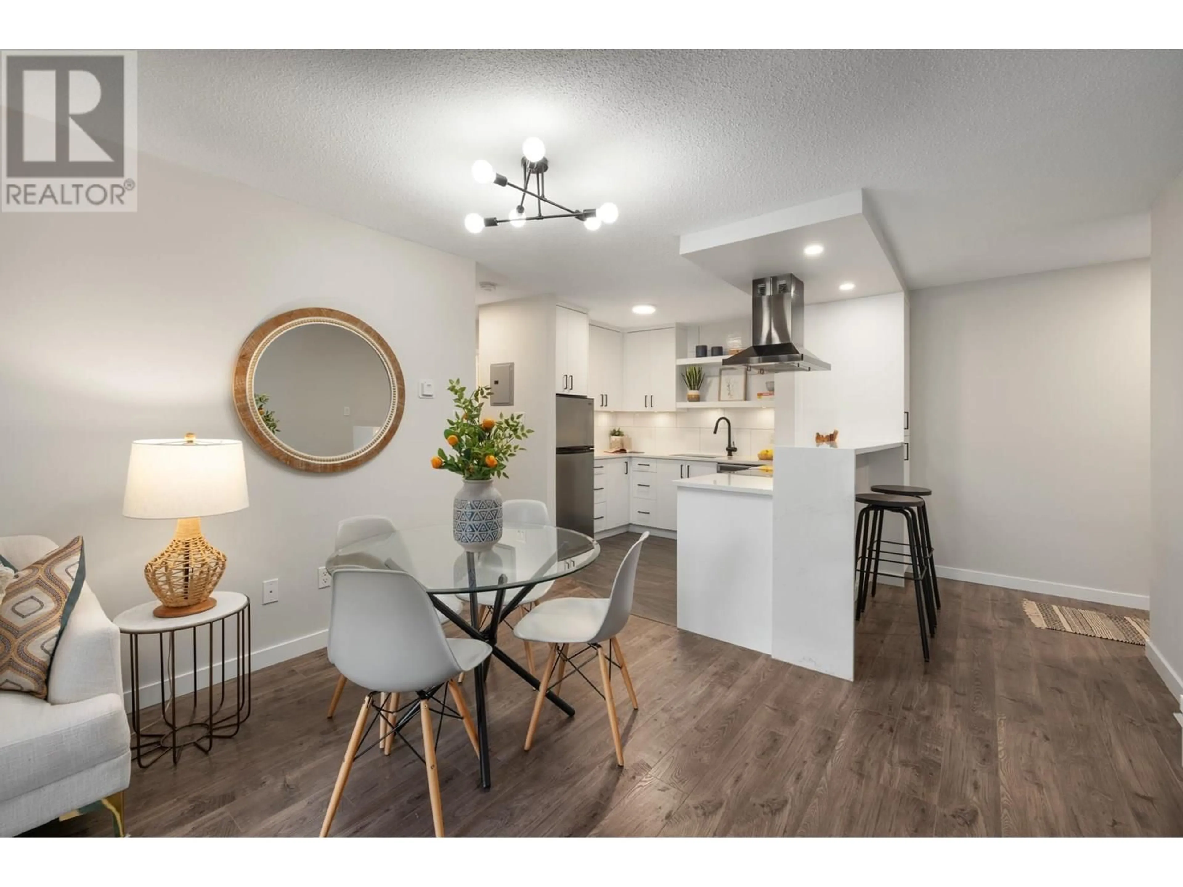 Open concept kitchen, wood/laminate floor for 403 - 360 2ND STREET, North Vancouver British Columbia V7L4N6