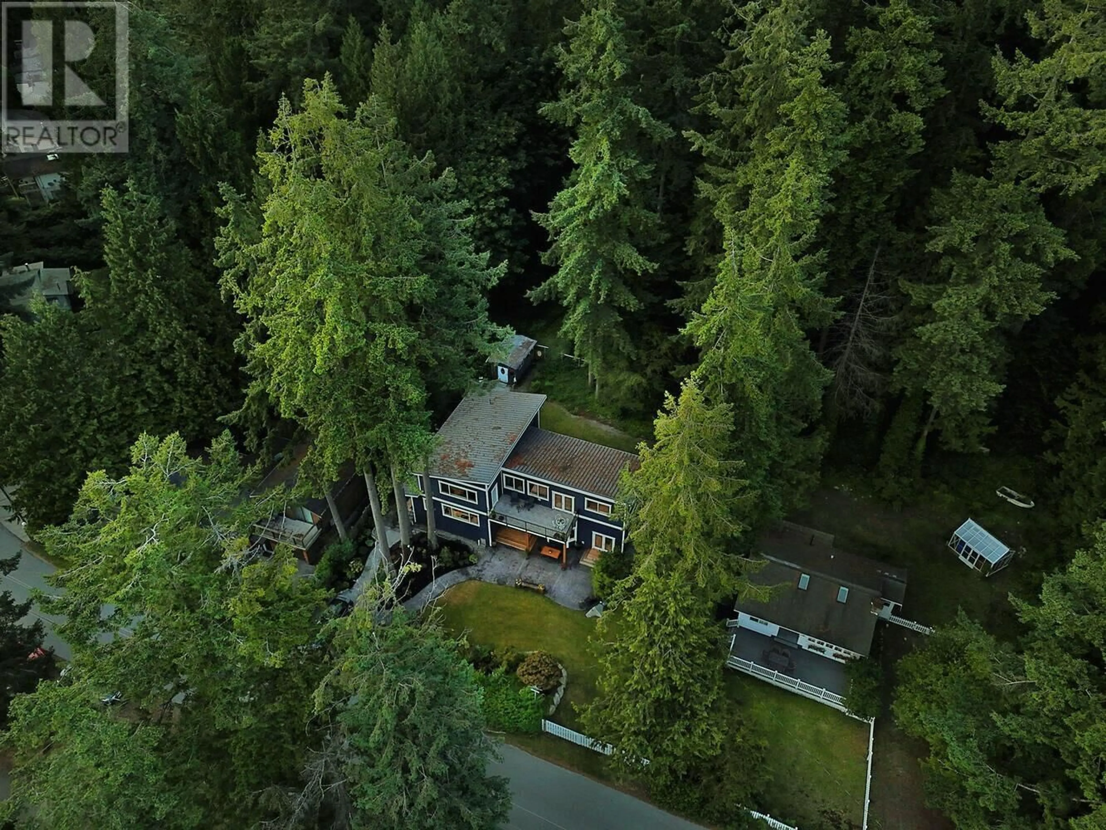 A pic from outside/outdoor area/front of a property/back of a property/a pic from drone, forest/trees view for 1590 OCEAN BEACH, Gibsons British Columbia V0N1V5