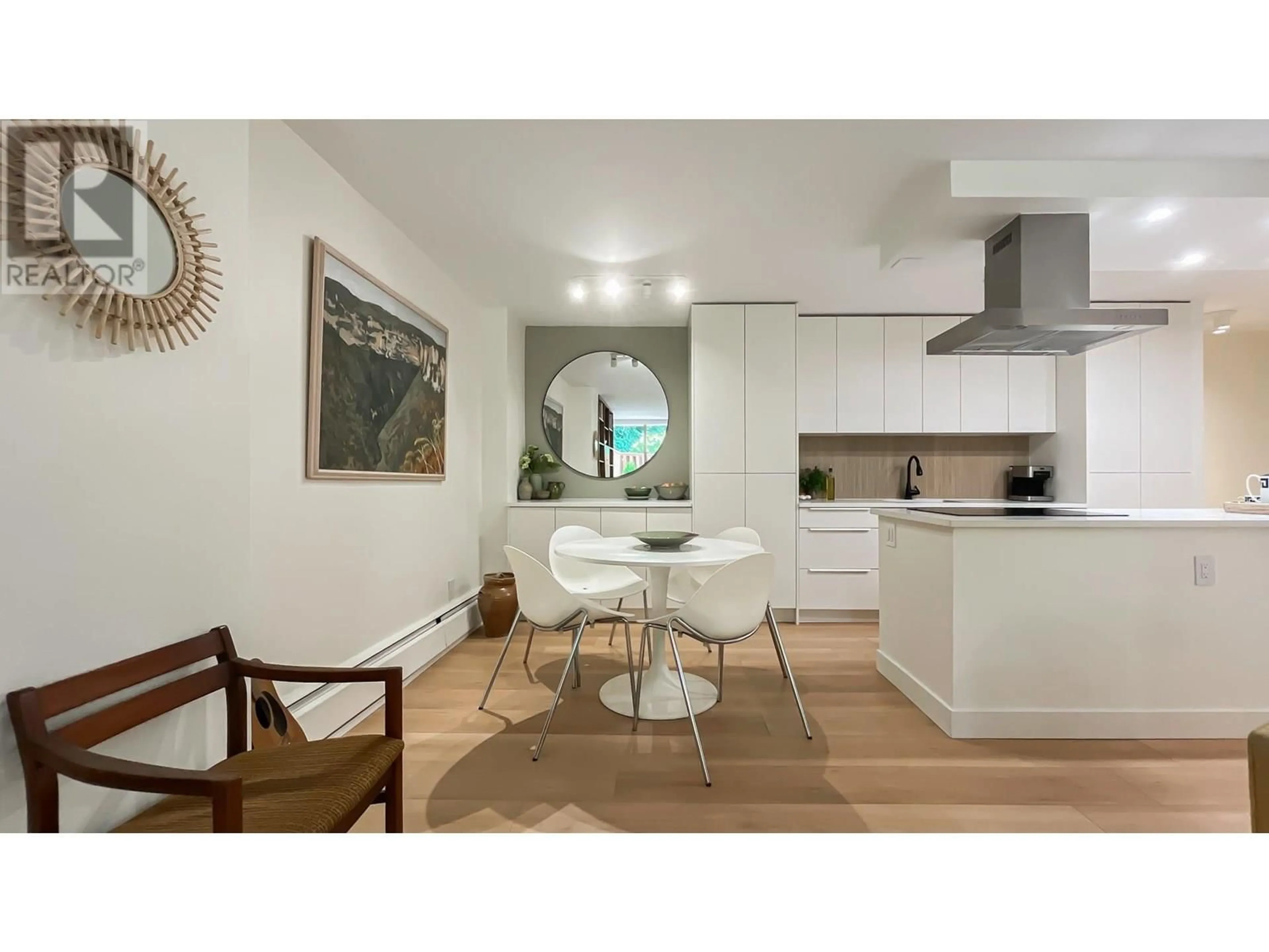 Open concept kitchen, unknown for 102 - 2016 FULLERTON AVENUE, North Vancouver British Columbia V7P3E6