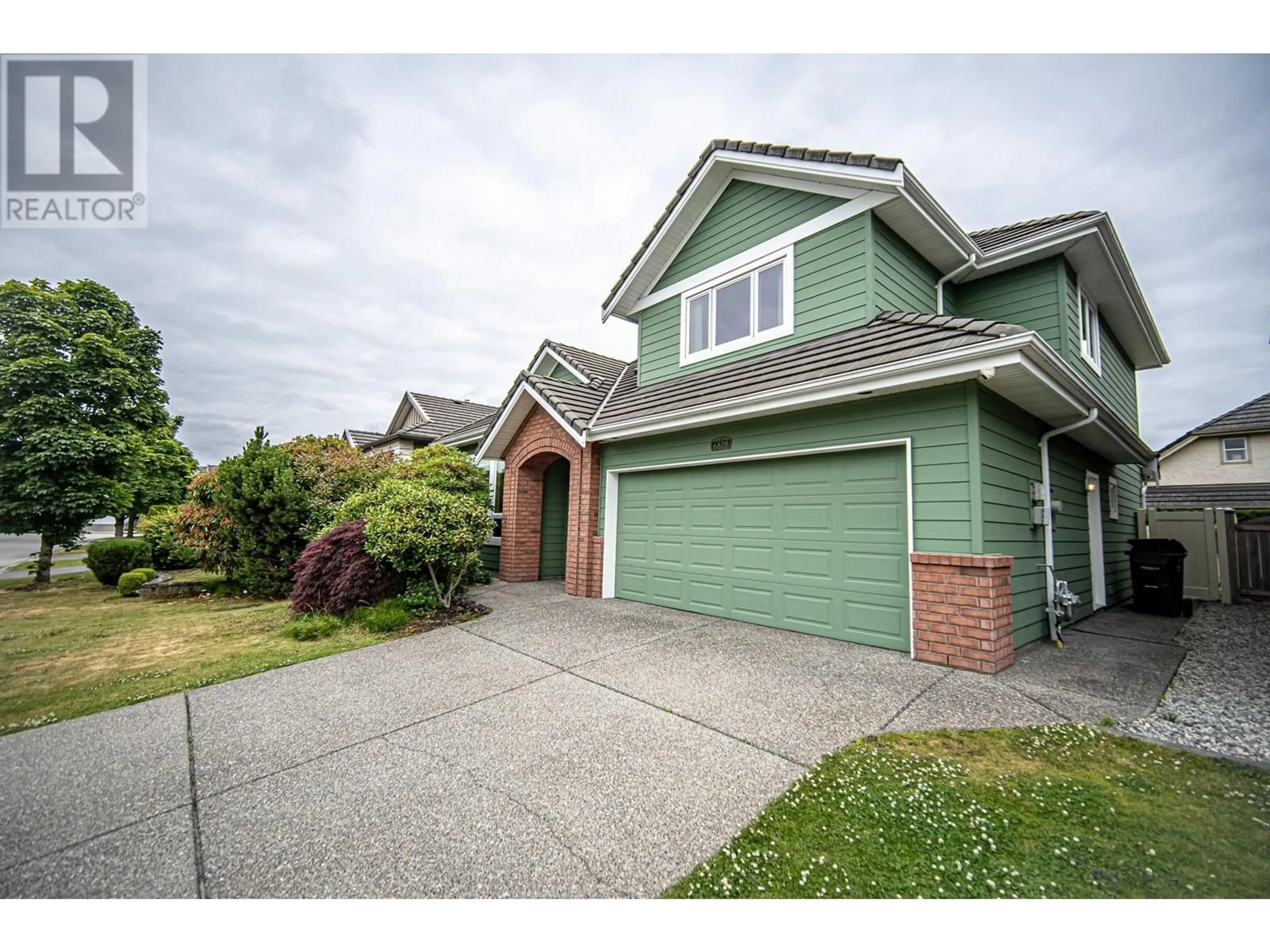 Home with vinyl exterior material, street for 6828 HAMBER STREET, Richmond British Columbia V7C5T2