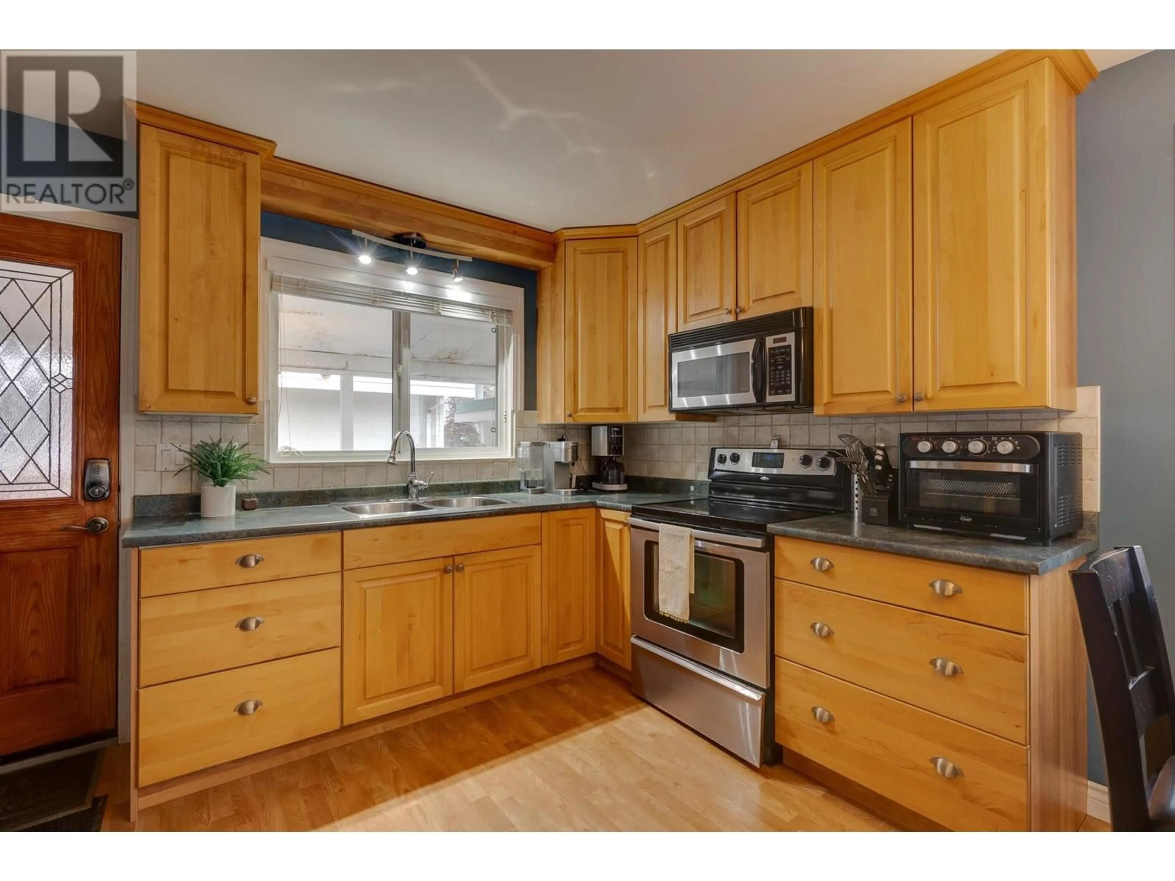 Standard kitchen, wood/laminate floor for 1302 PARSNIP CRESCENT, Prince George British Columbia V2M4C4