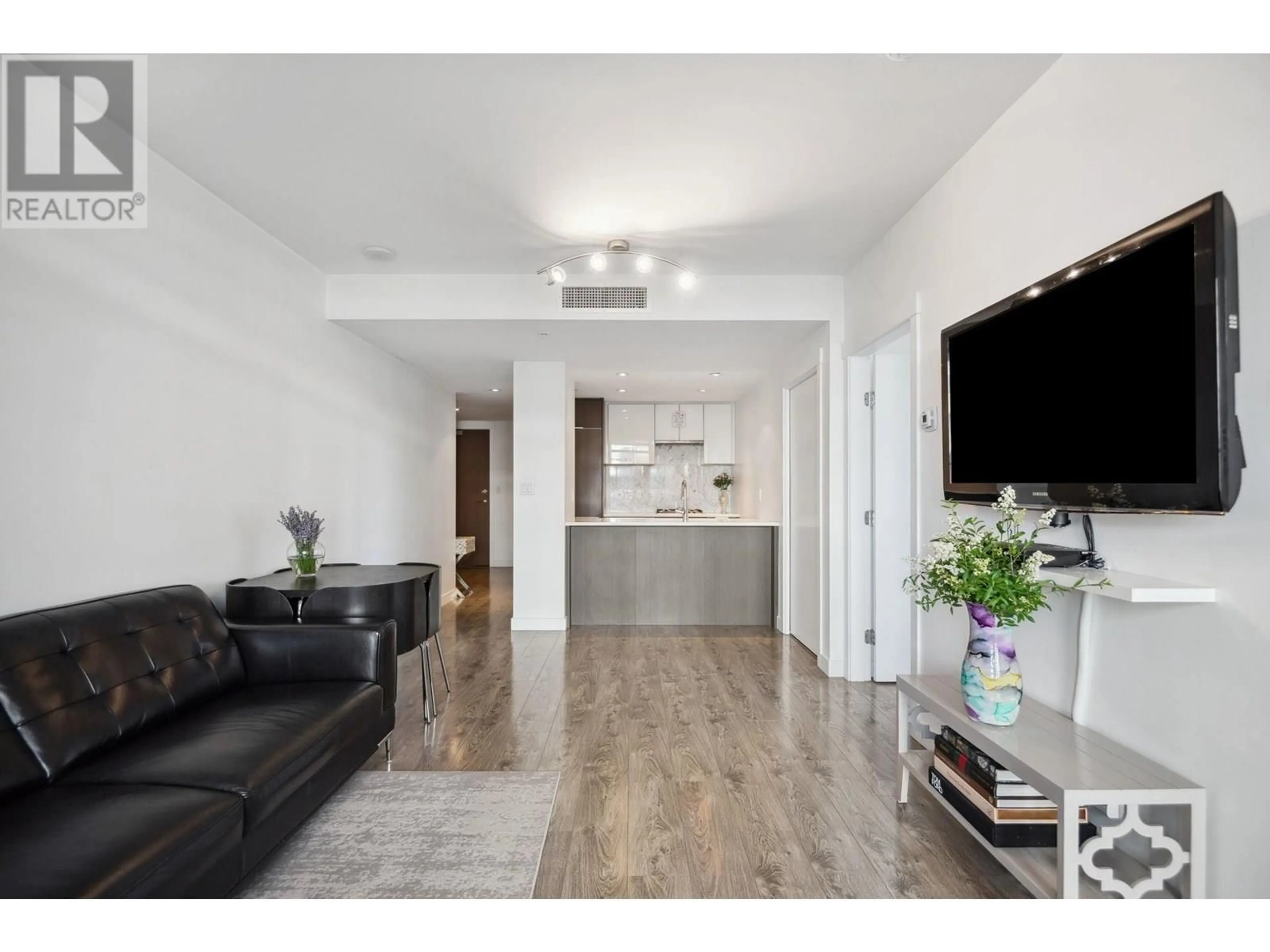 Living room with furniture, wood/laminate floor for 502 - 110 SWITCHMEN STREET, Vancouver British Columbia V6A0C6