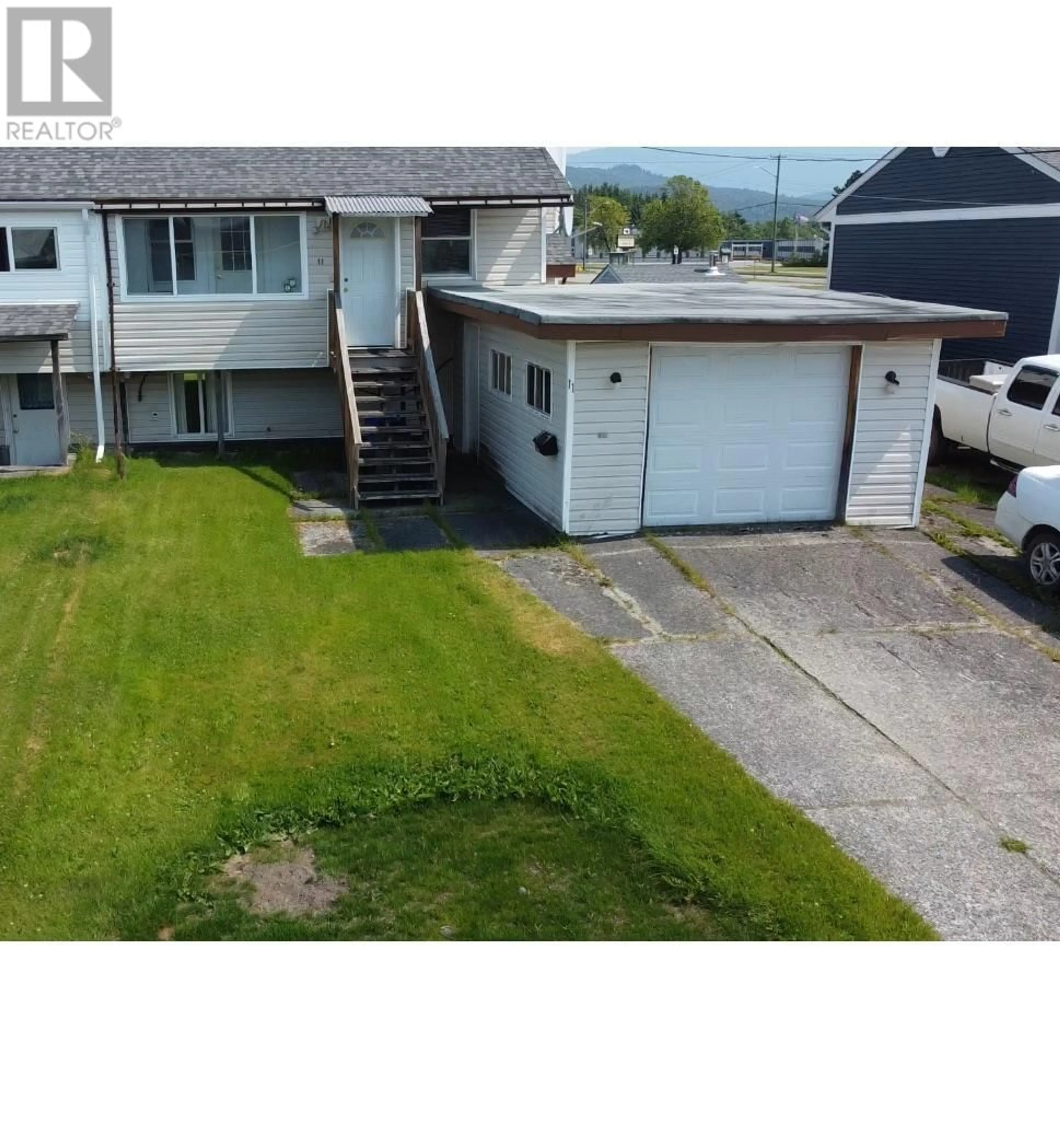A pic from outside/outdoor area/front of a property/back of a property/a pic from drone, street for 11 HERON STREET, Kitimat British Columbia V8C1N3