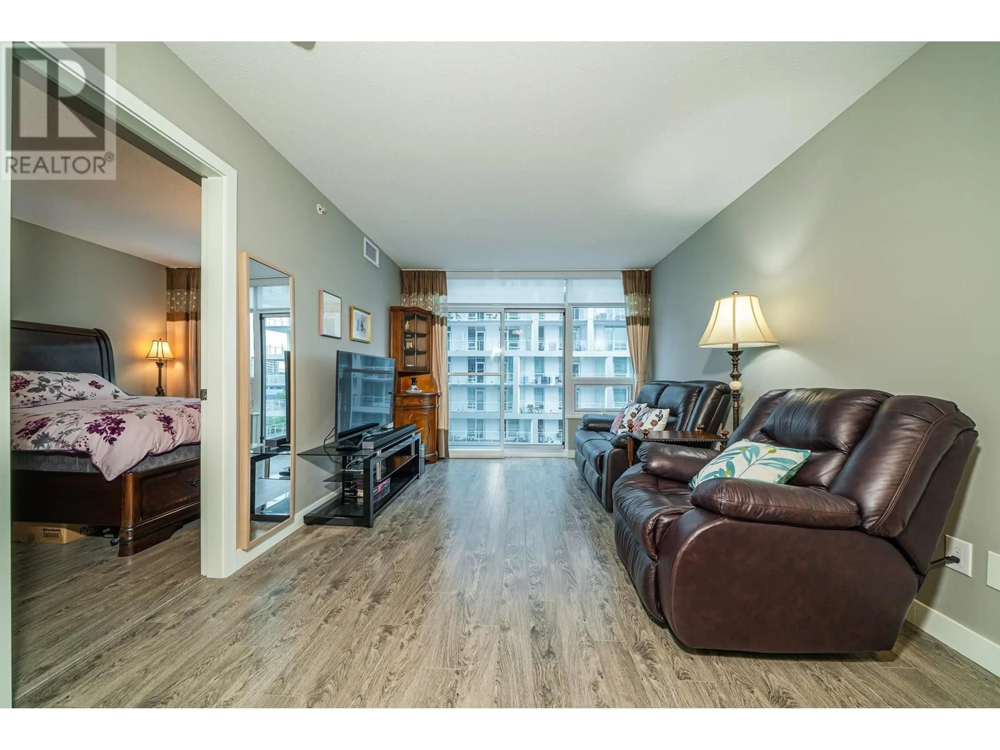 Living room with furniture, wood/laminate floor for 859 - 6288 NO. 3 ROAD, Richmond British Columbia V6Y0J4