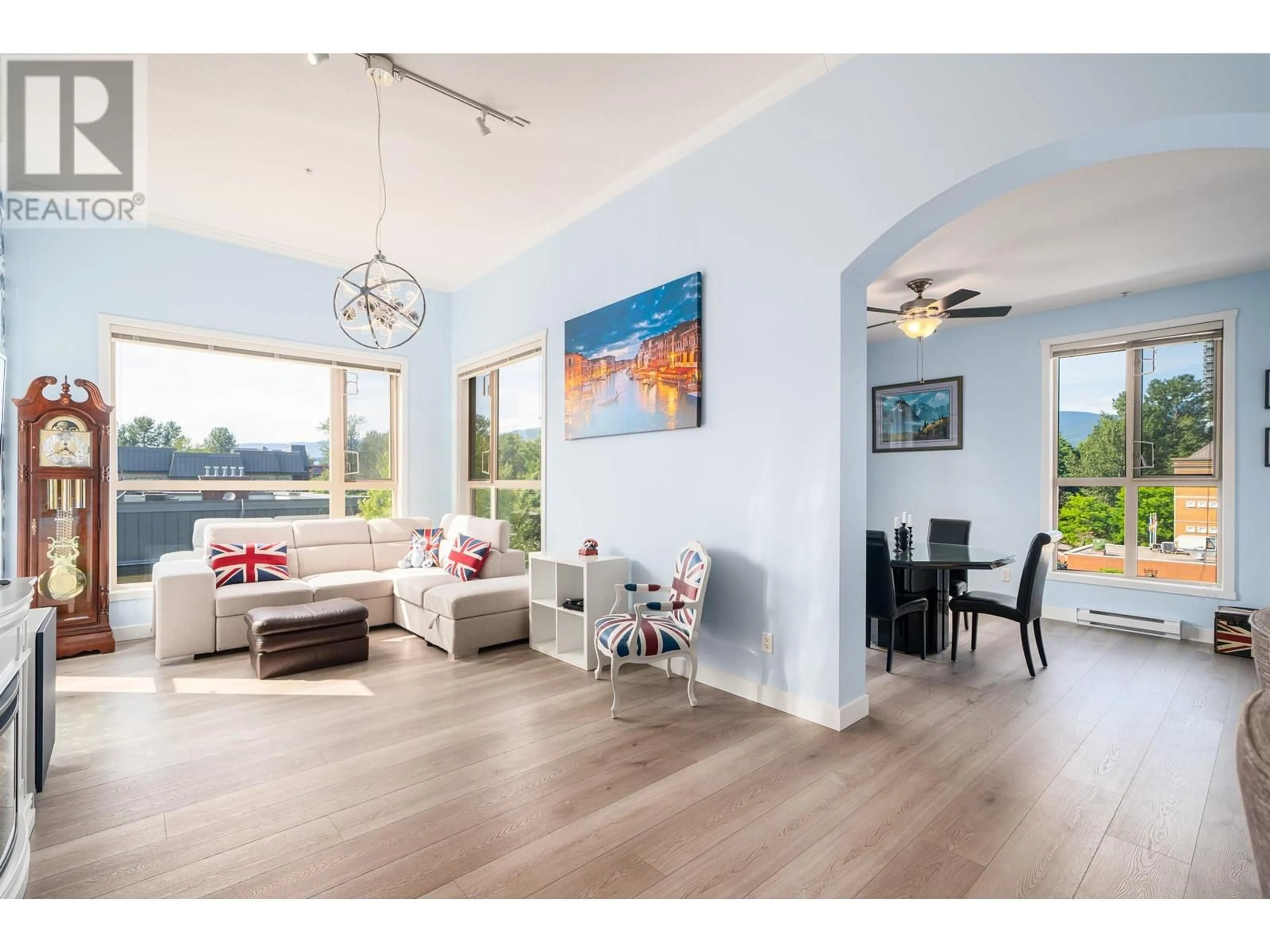 Living room with furniture, wood/laminate floor for 410 - 2627 SHAUGHNESSY STREET, Port Coquitlam British Columbia V3C0E1