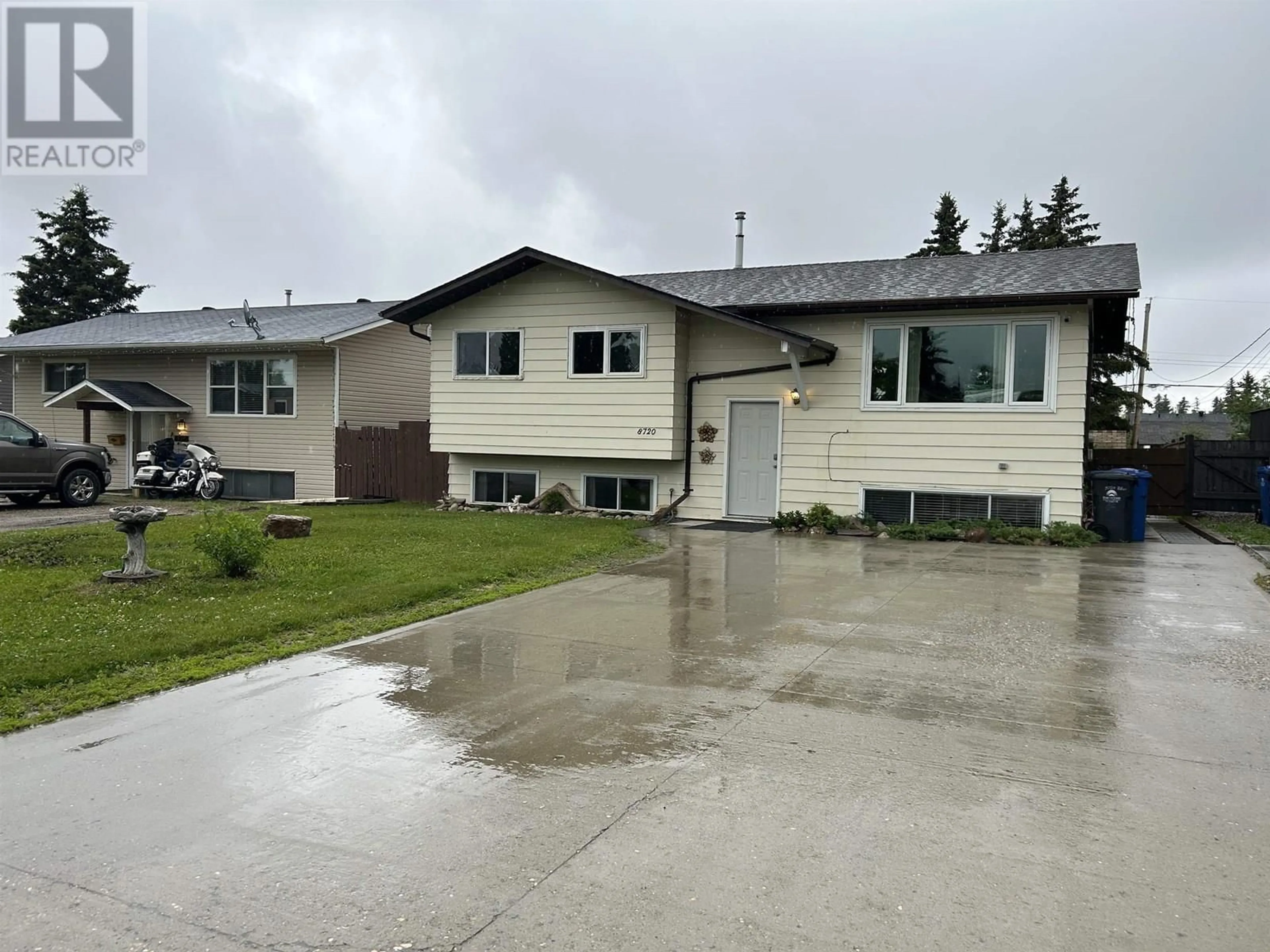 Home with vinyl exterior material, street for 8720 88 STREET, Fort St. John British Columbia V1J5A9