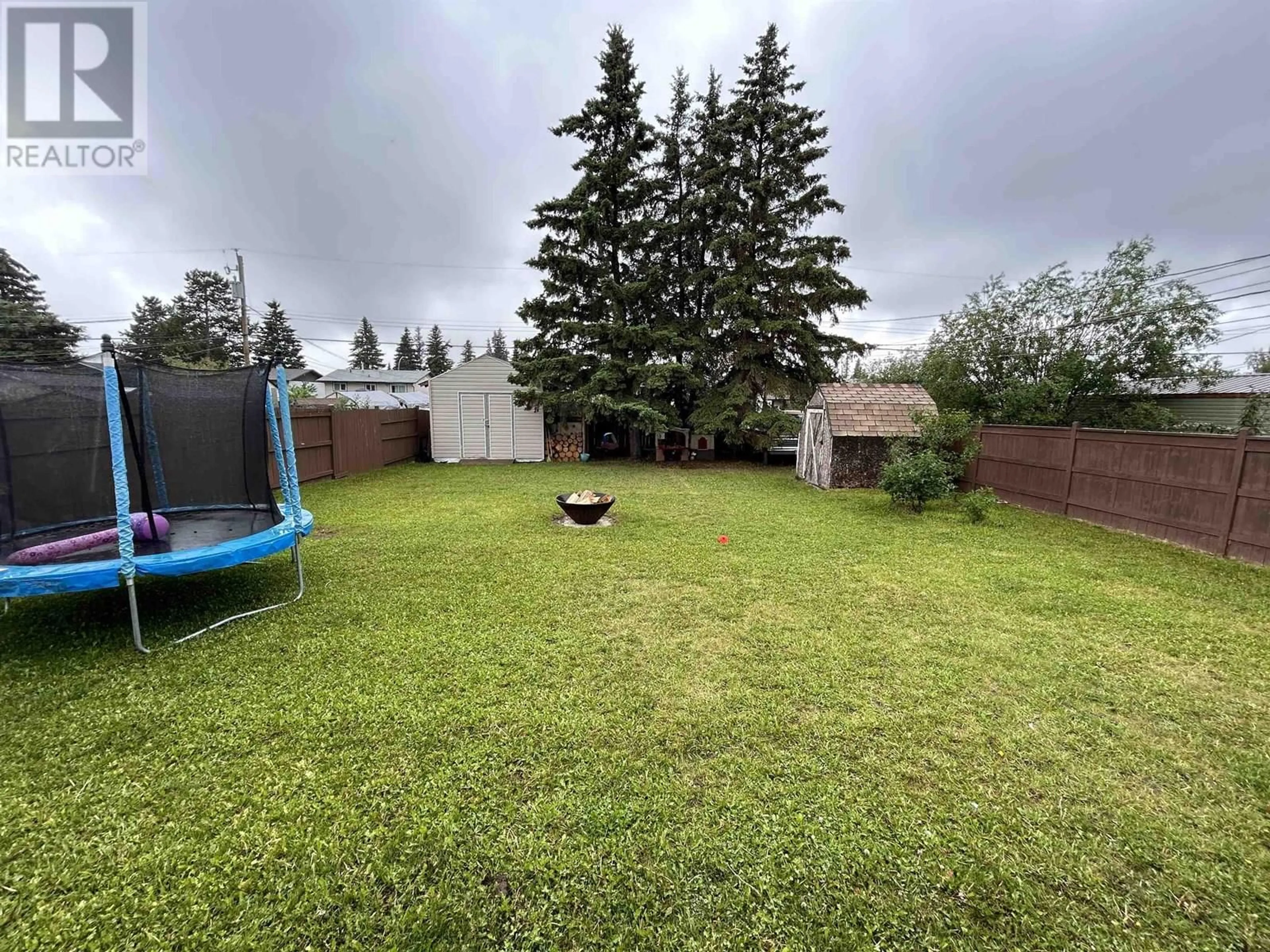 A pic from outside/outdoor area/front of a property/back of a property/a pic from drone, unknown for 8720 88 STREET, Fort St. John British Columbia V1J5A9