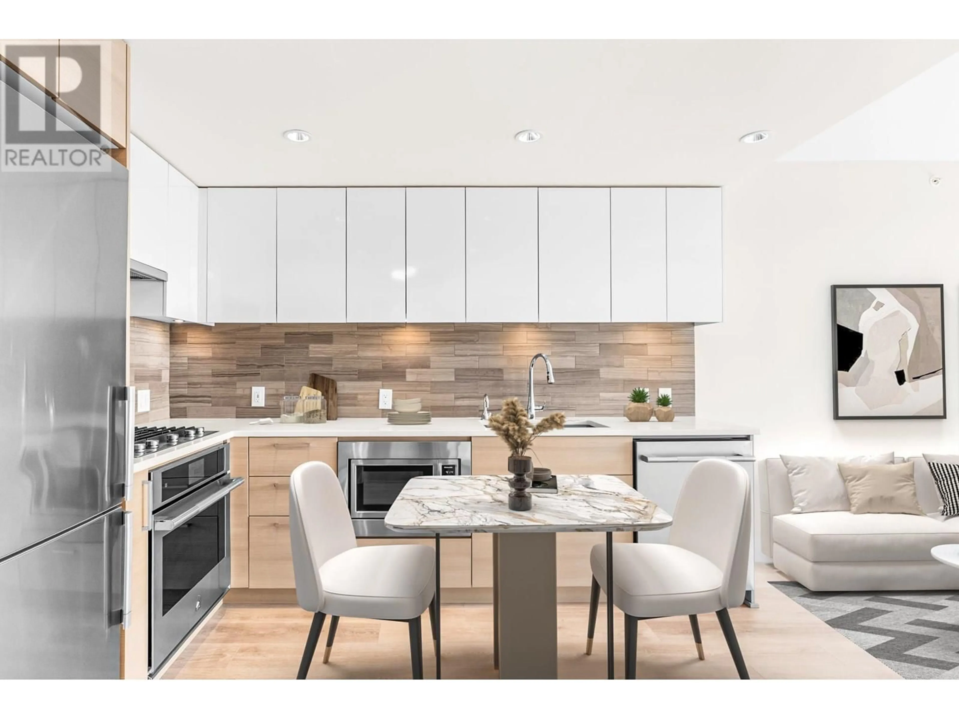 Open concept kitchen, wood/laminate floor for 1306 - 8533 RIVER DISTRICT CROSSING, Vancouver British Columbia V5S0H2