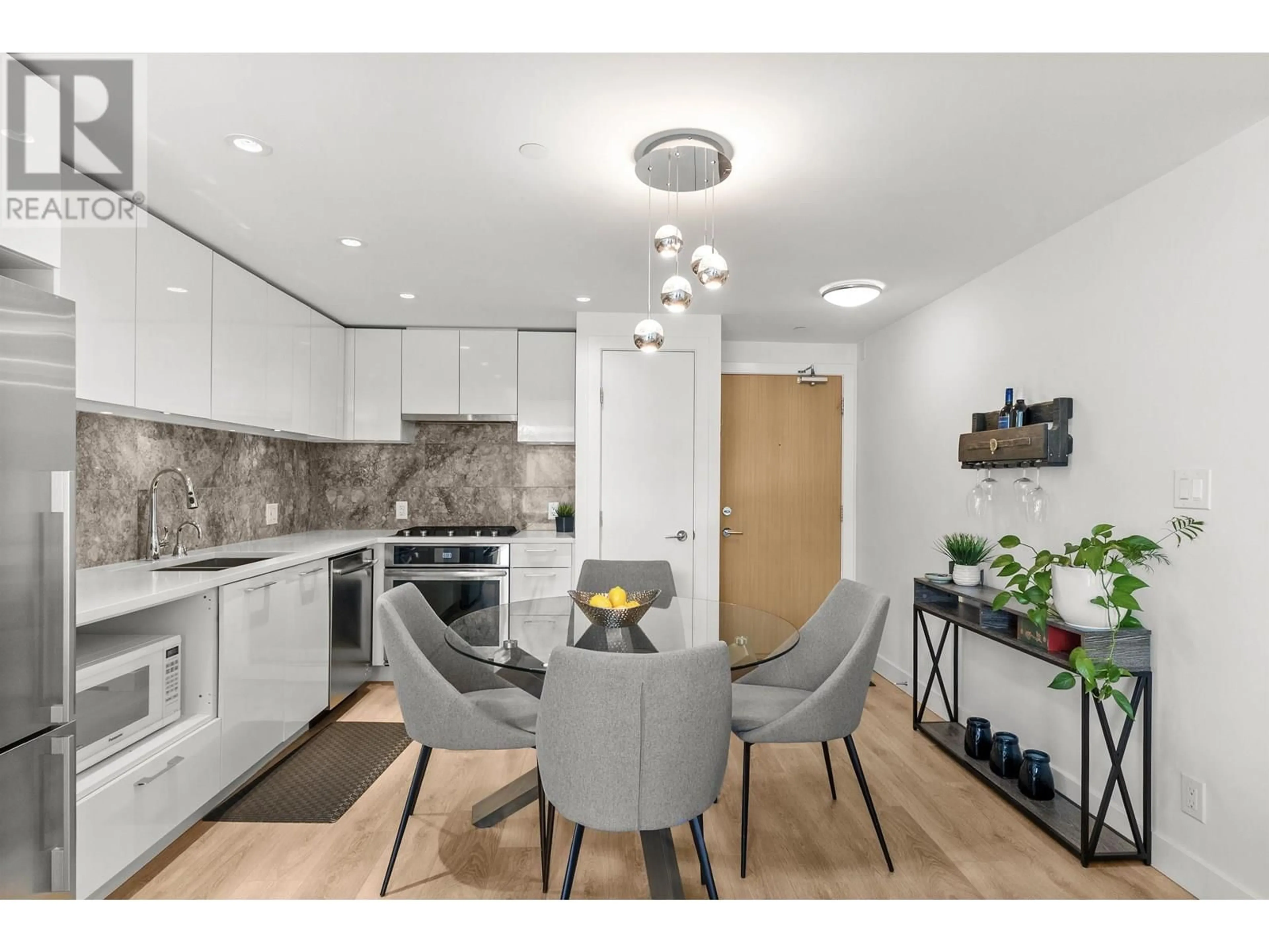 Open concept kitchen, unknown for 205 - 3557 SAWMILL CRESCENT, Vancouver British Columbia V5S0E2