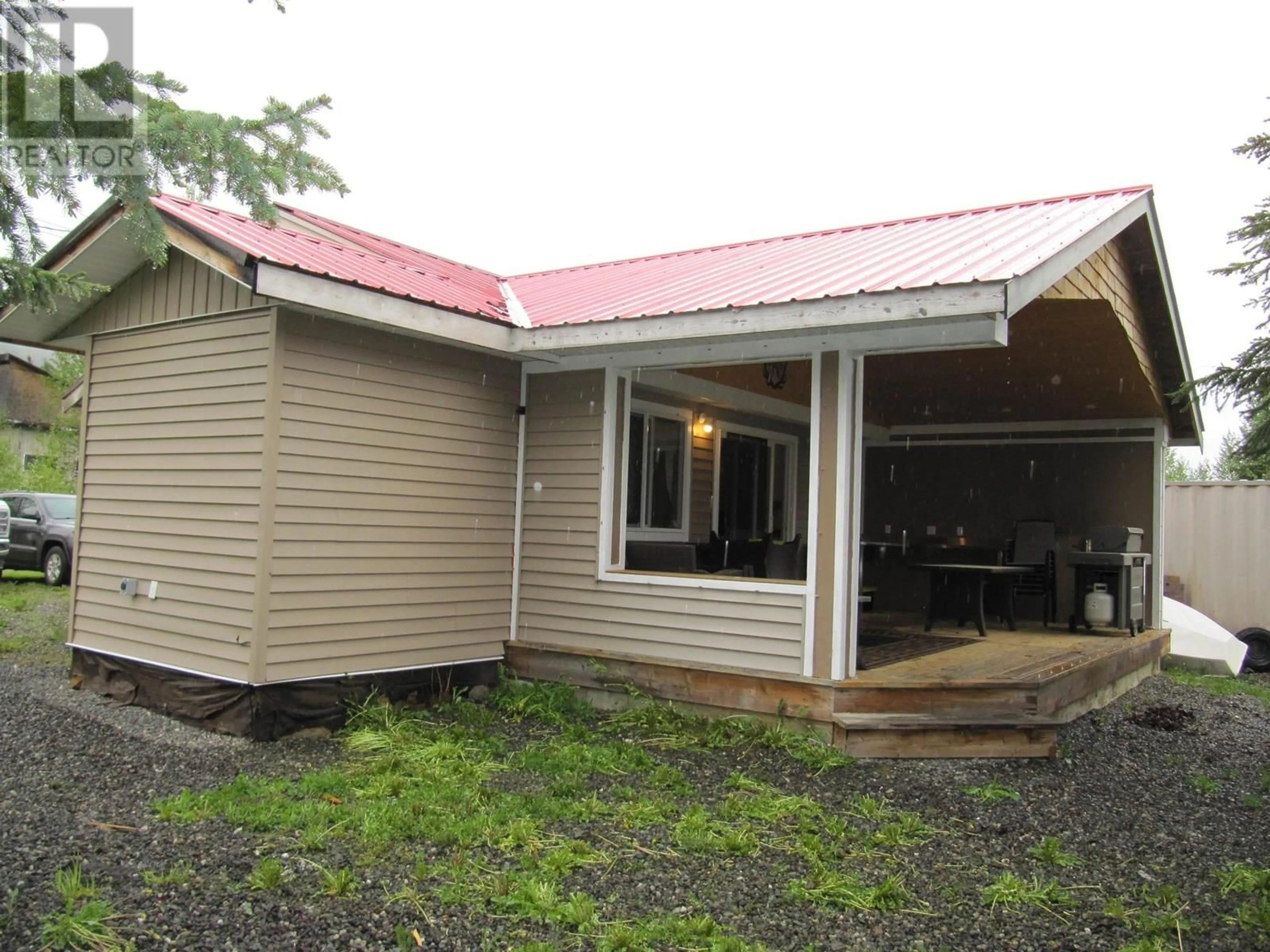 Home with vinyl exterior material, building for 656 B ROAD, 100 Mile House British Columbia V0K1L0