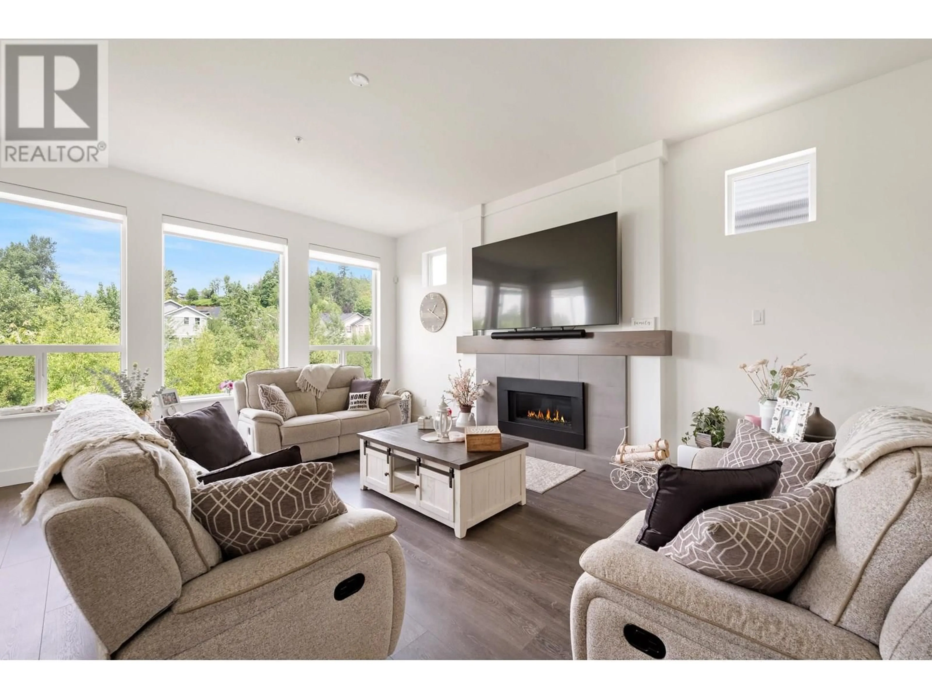 Living room with furniture, wood/laminate floor for 23873 103A AVENUE, Maple Ridge British Columbia V2W1G3