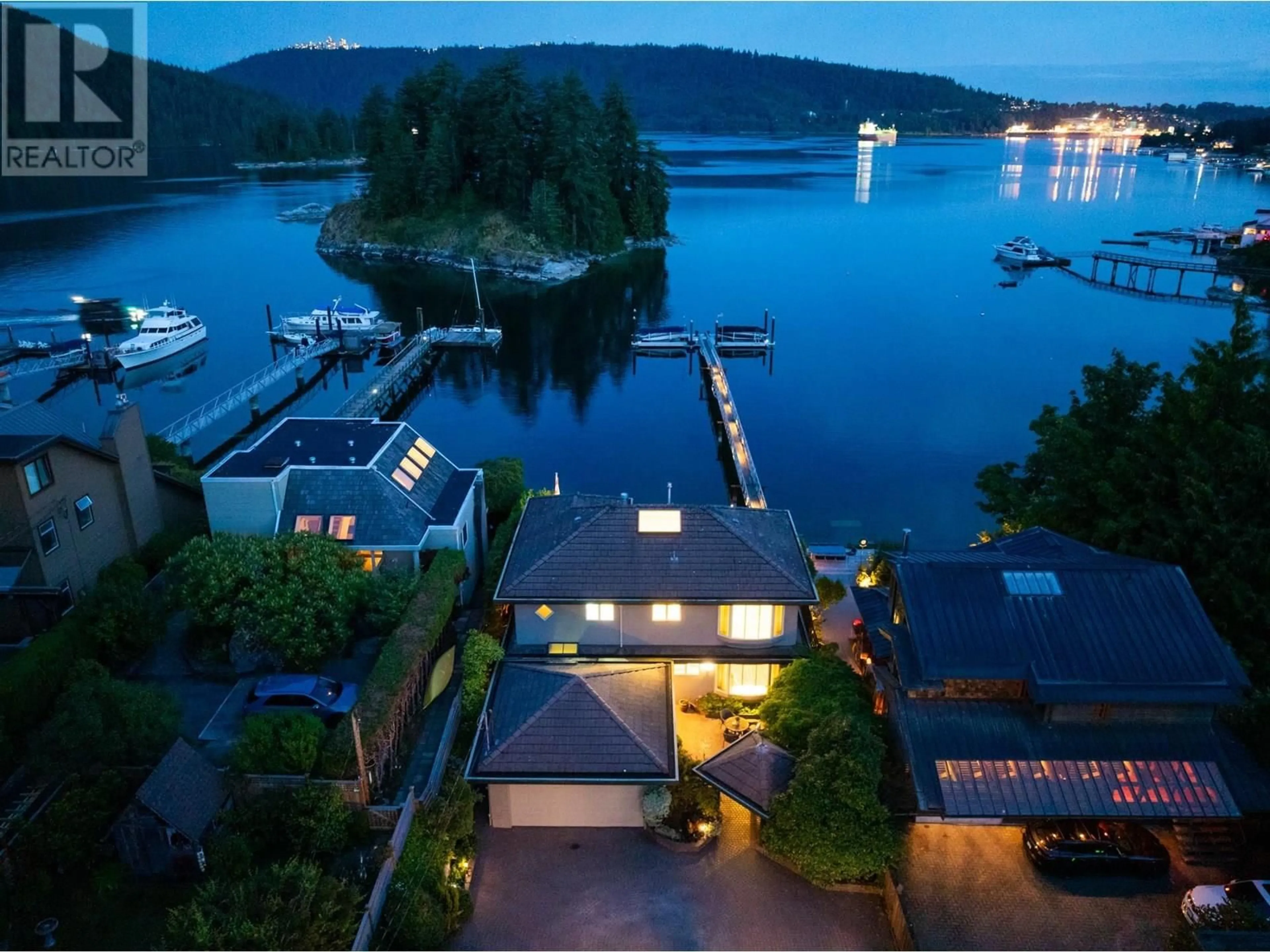 A pic from outside/outdoor area/front of a property/back of a property/a pic from drone, water/lake/river/ocean view for 4625 STRATHCONA ROAD, North Vancouver British Columbia V7G1G7