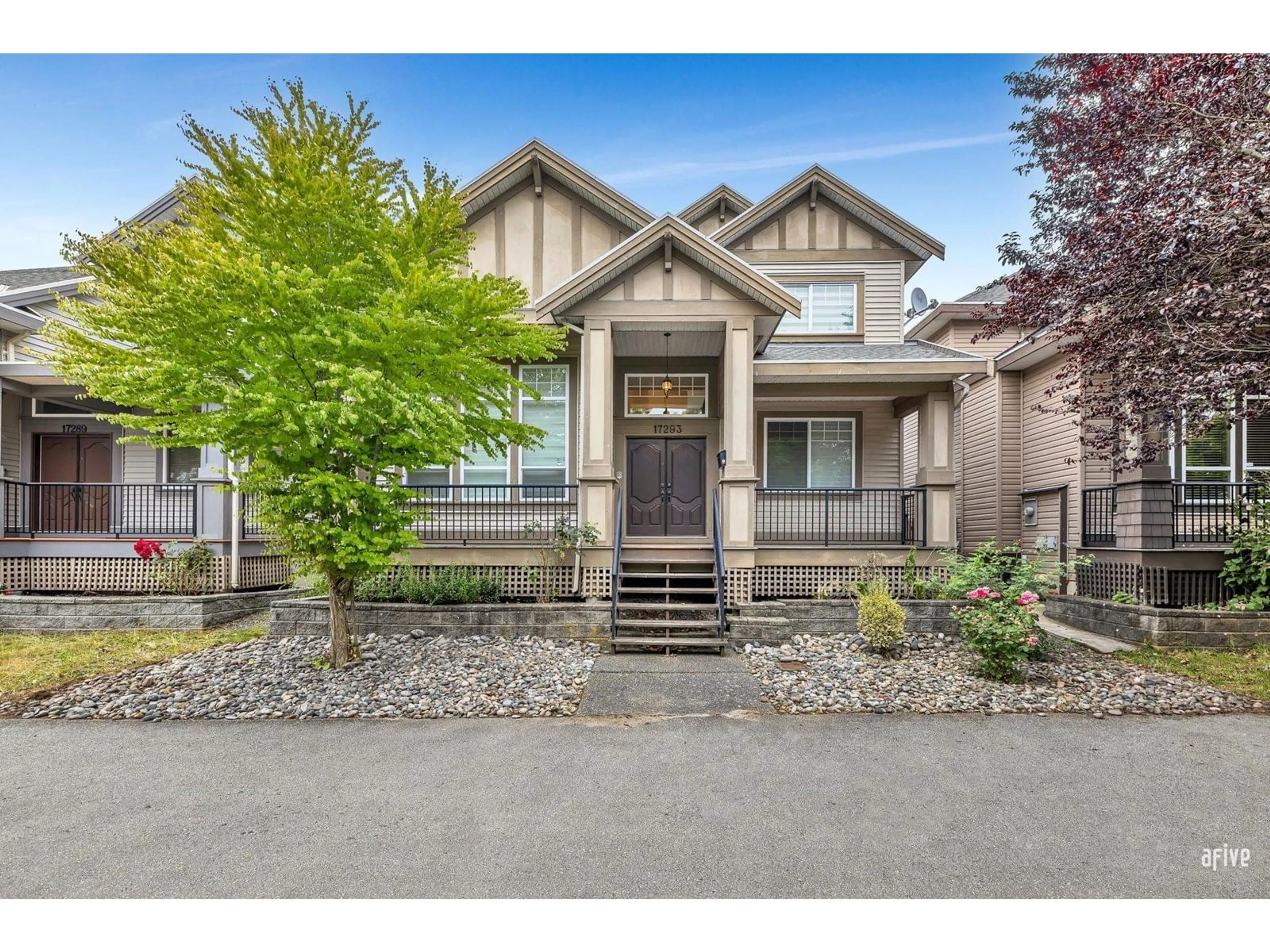 Home with vinyl exterior material, street for 17293 64, Surrey British Columbia V3S1Y6
