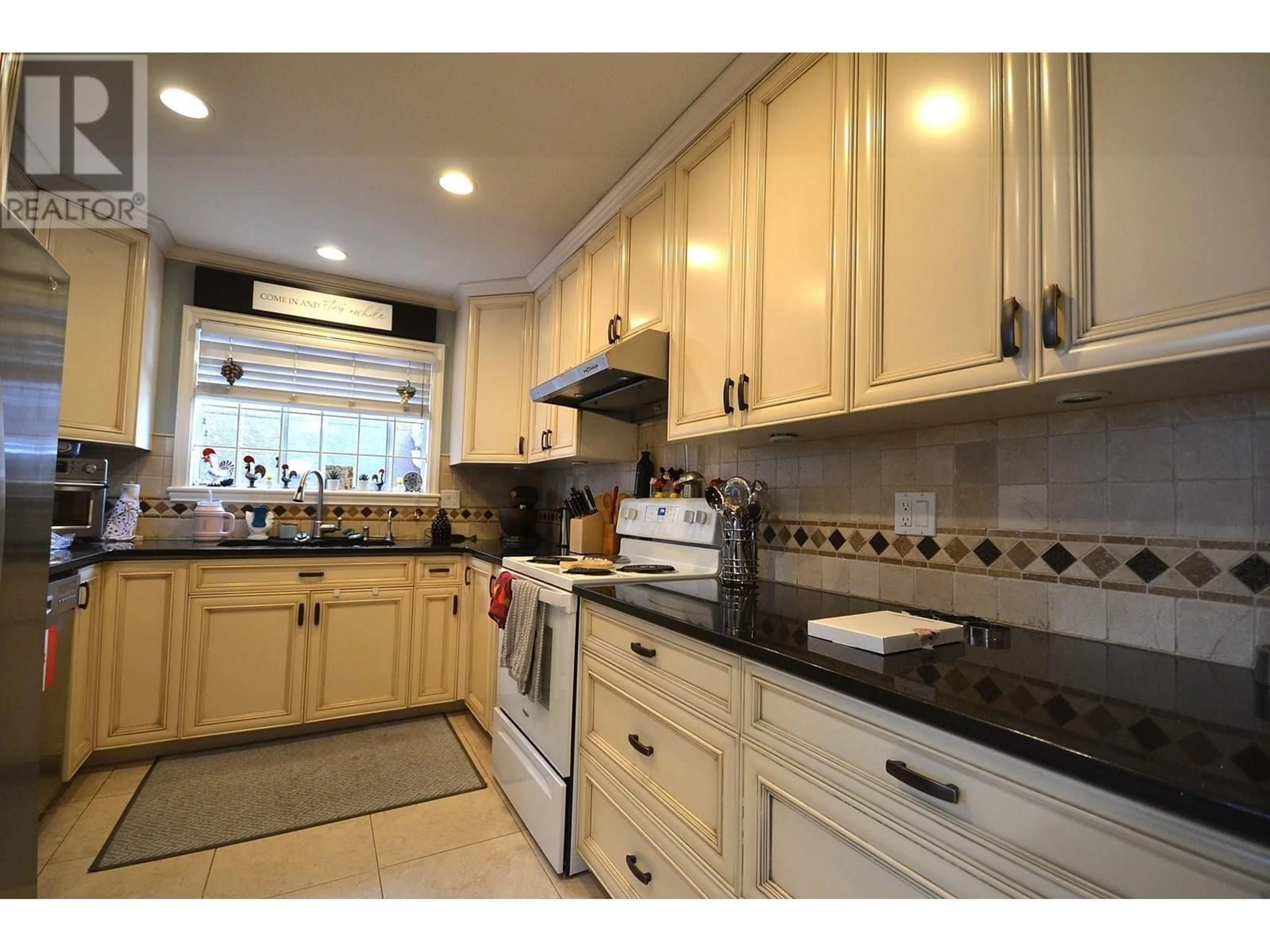Standard kitchen, ceramic/tile floor for 8832 15TH AVENUE, Burnaby British Columbia V3N1Y3