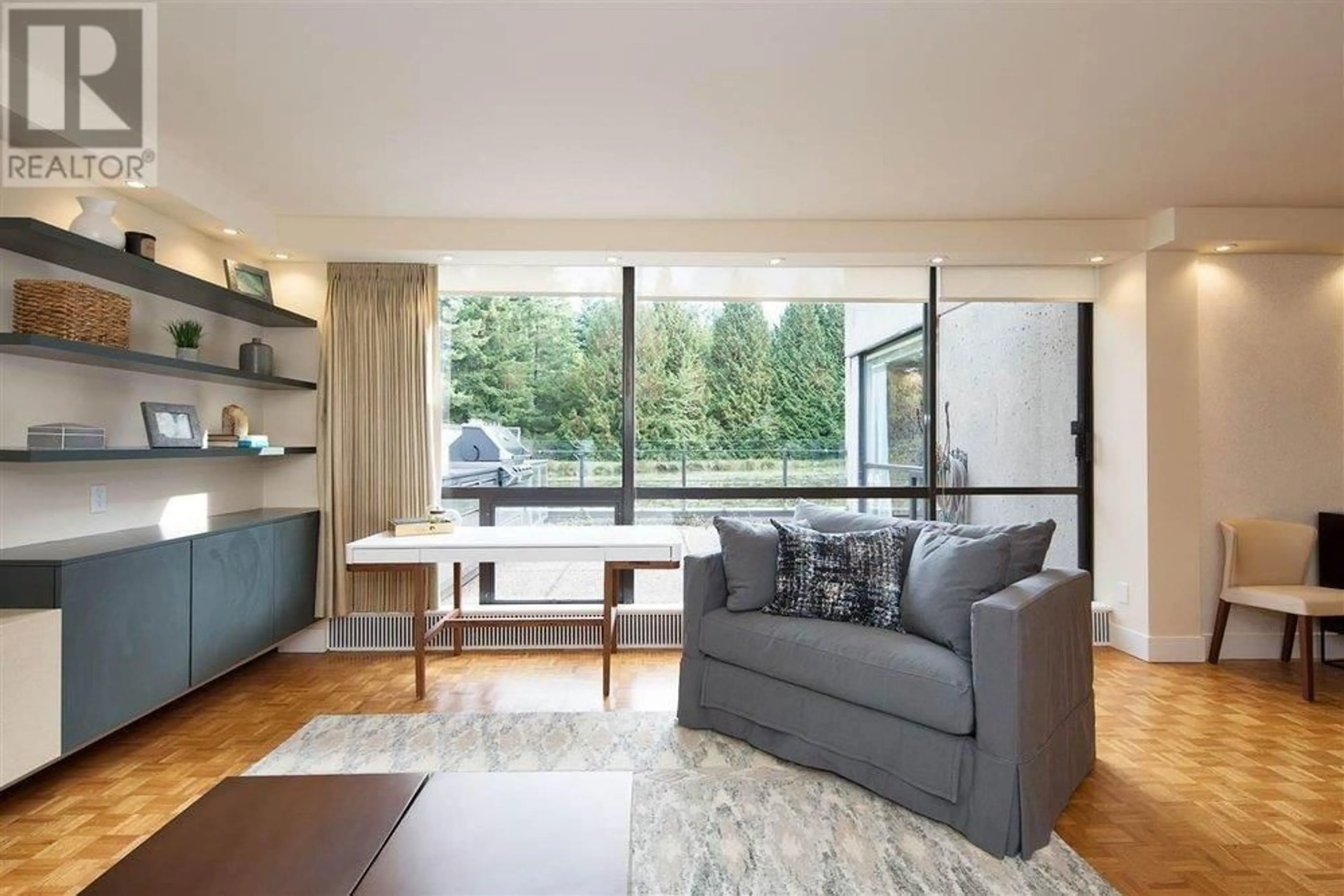 Living room with furniture, wood/laminate floor for 108 - 4900 CARTIER STREET, Vancouver British Columbia V6M4H2