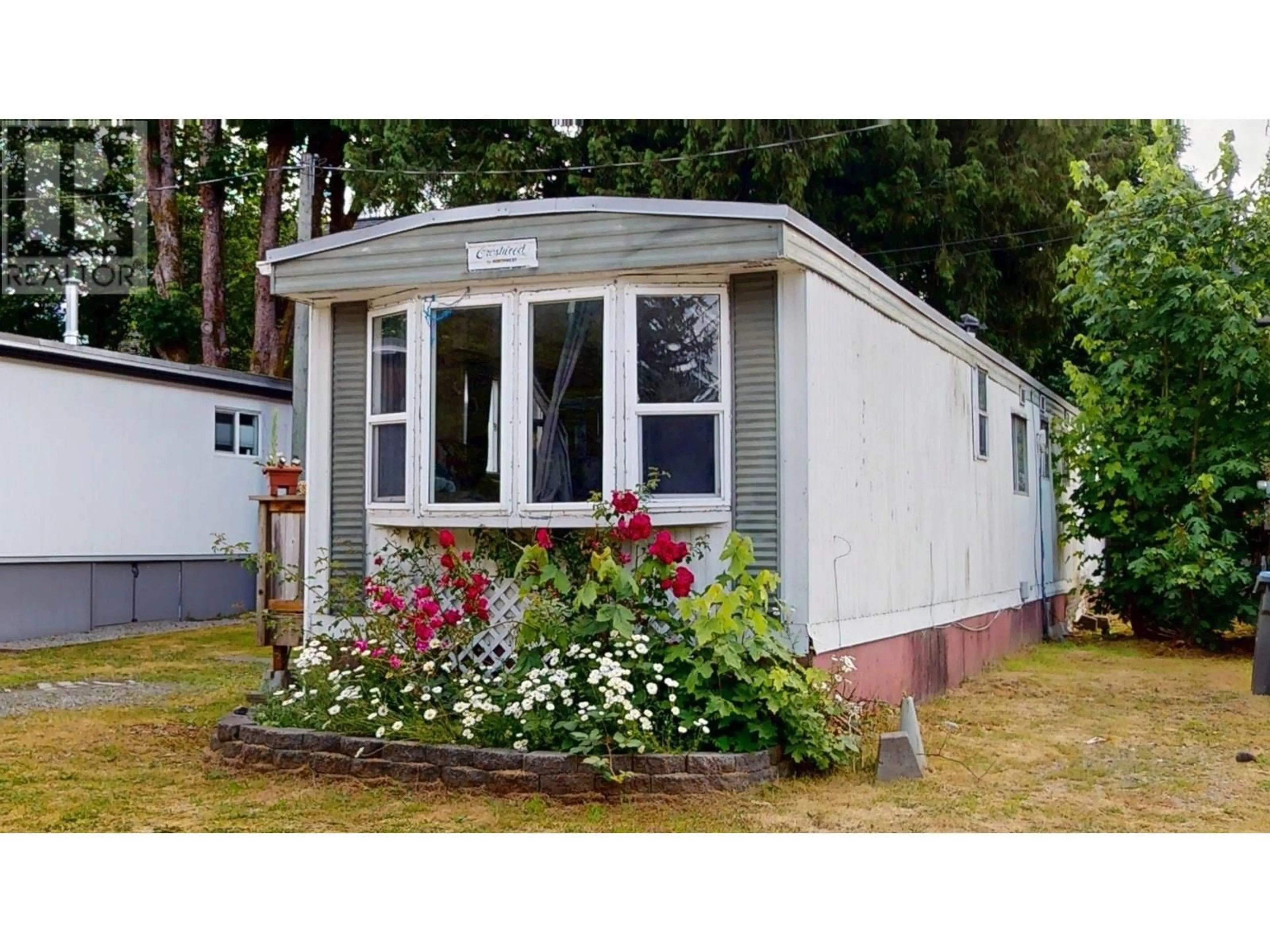 Home with vinyl exterior material, street for 3 - 40022 GOVERNMENT ROAD, Squamish British Columbia V0N3G0