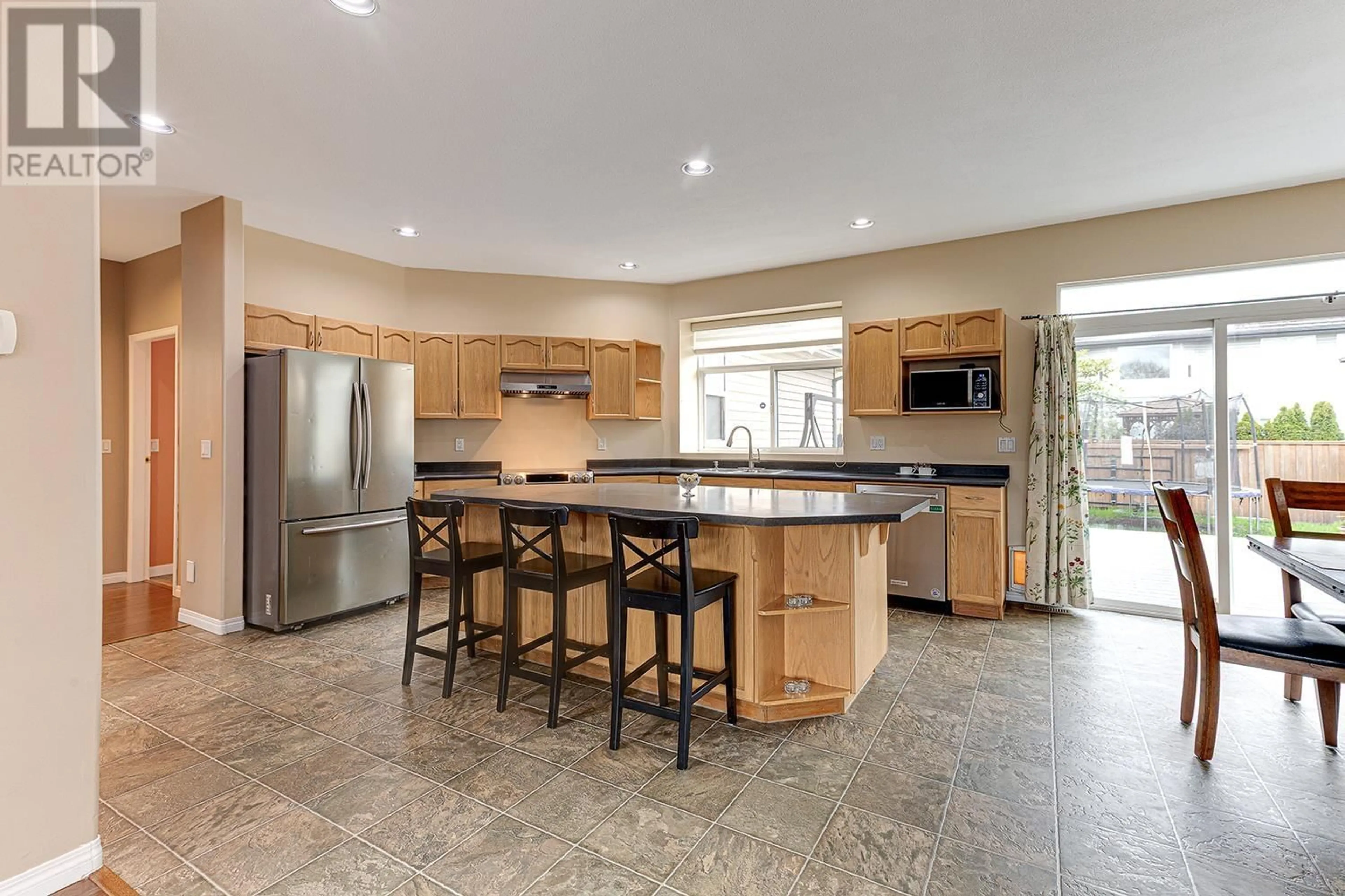 Open concept kitchen, ceramic/tile floor for 1077 RIVERSIDE DRIVE, Port Coquitlam British Columbia V3B8A7