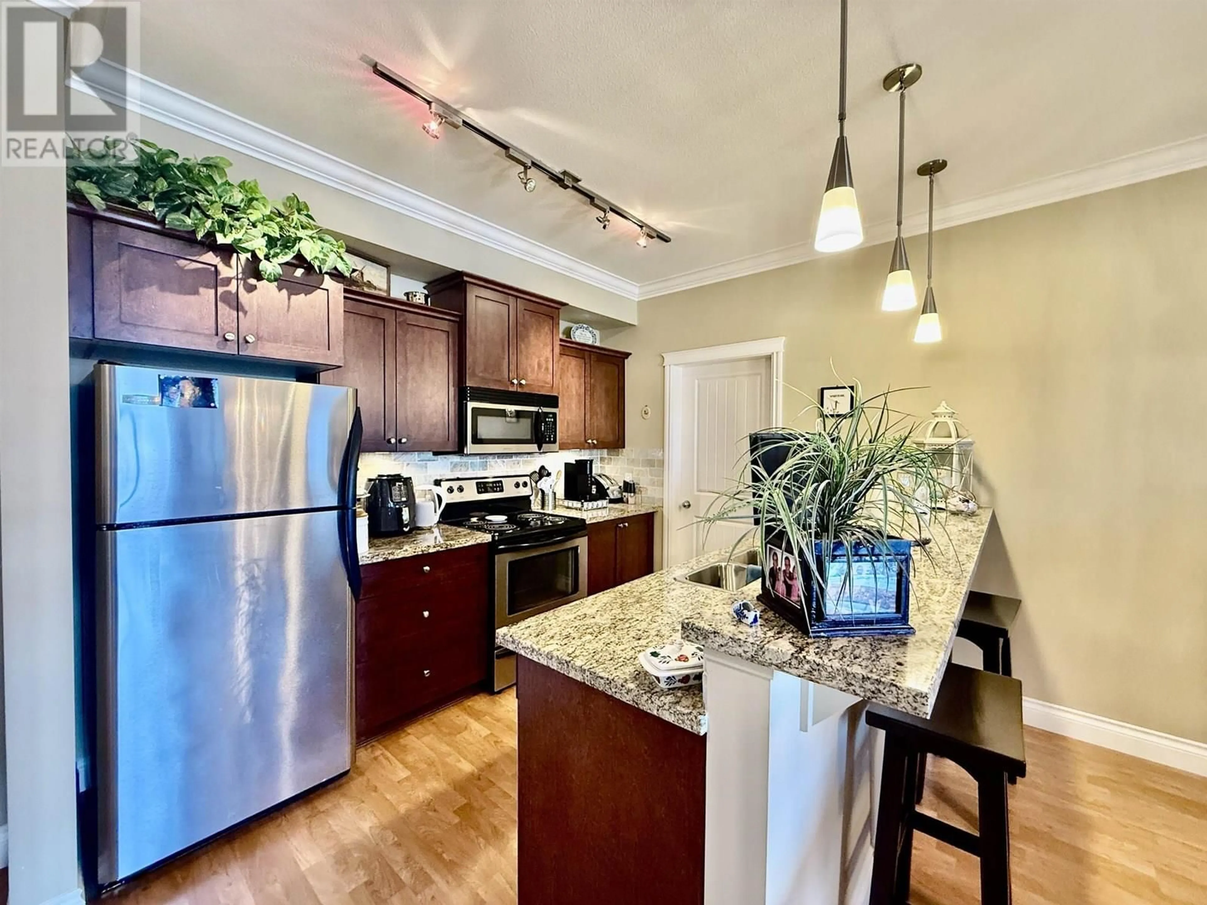 Open concept kitchen, unknown for 215 - 12258 224 STREET, Maple Ridge British Columbia V2X8Y7