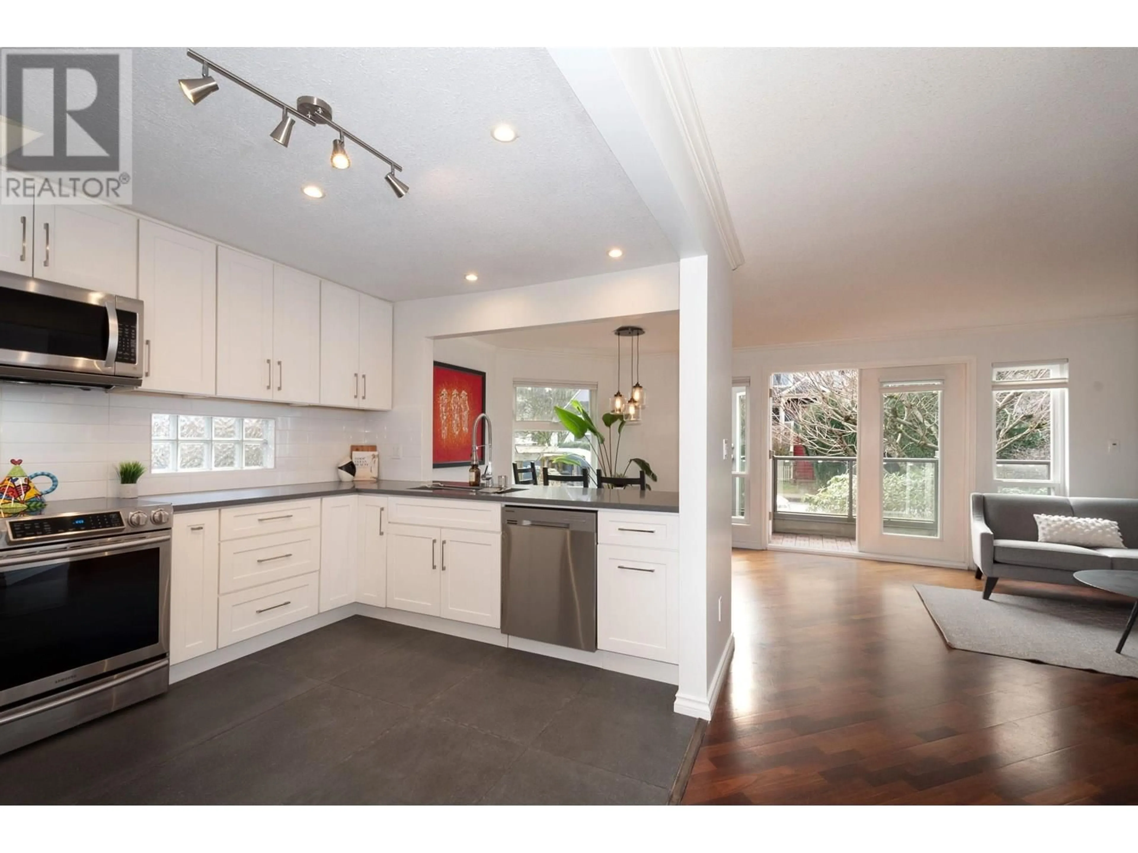 Contemporary kitchen, ceramic/tile floor for 202 - 1959 2ND AVENUE, Vancouver British Columbia V6J1J2