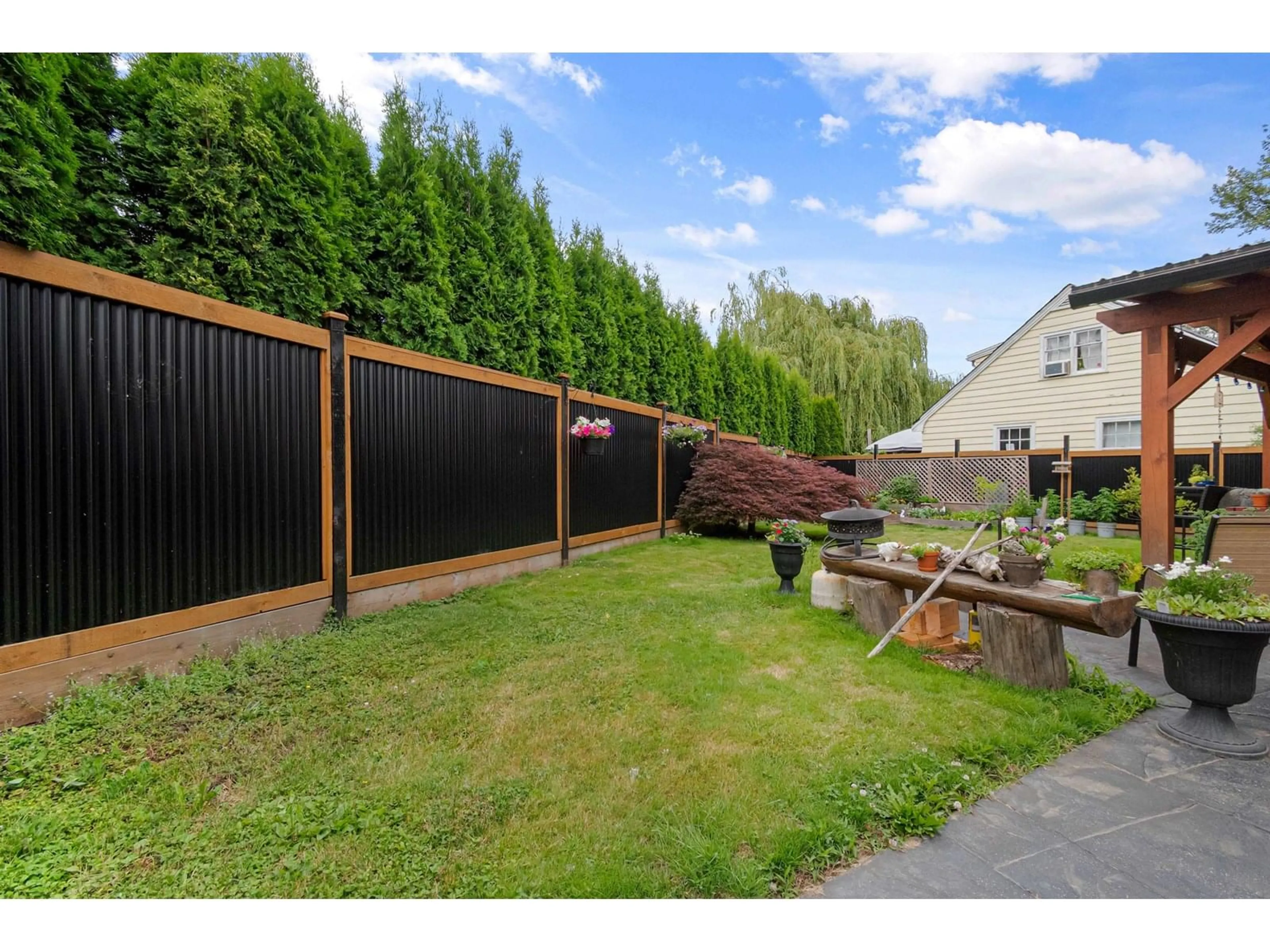 A pic from outside/outdoor area/front of a property/back of a property/a pic from drone, street for 46611 HOPE RIVER ROAD, Chilliwack British Columbia V2P7L5