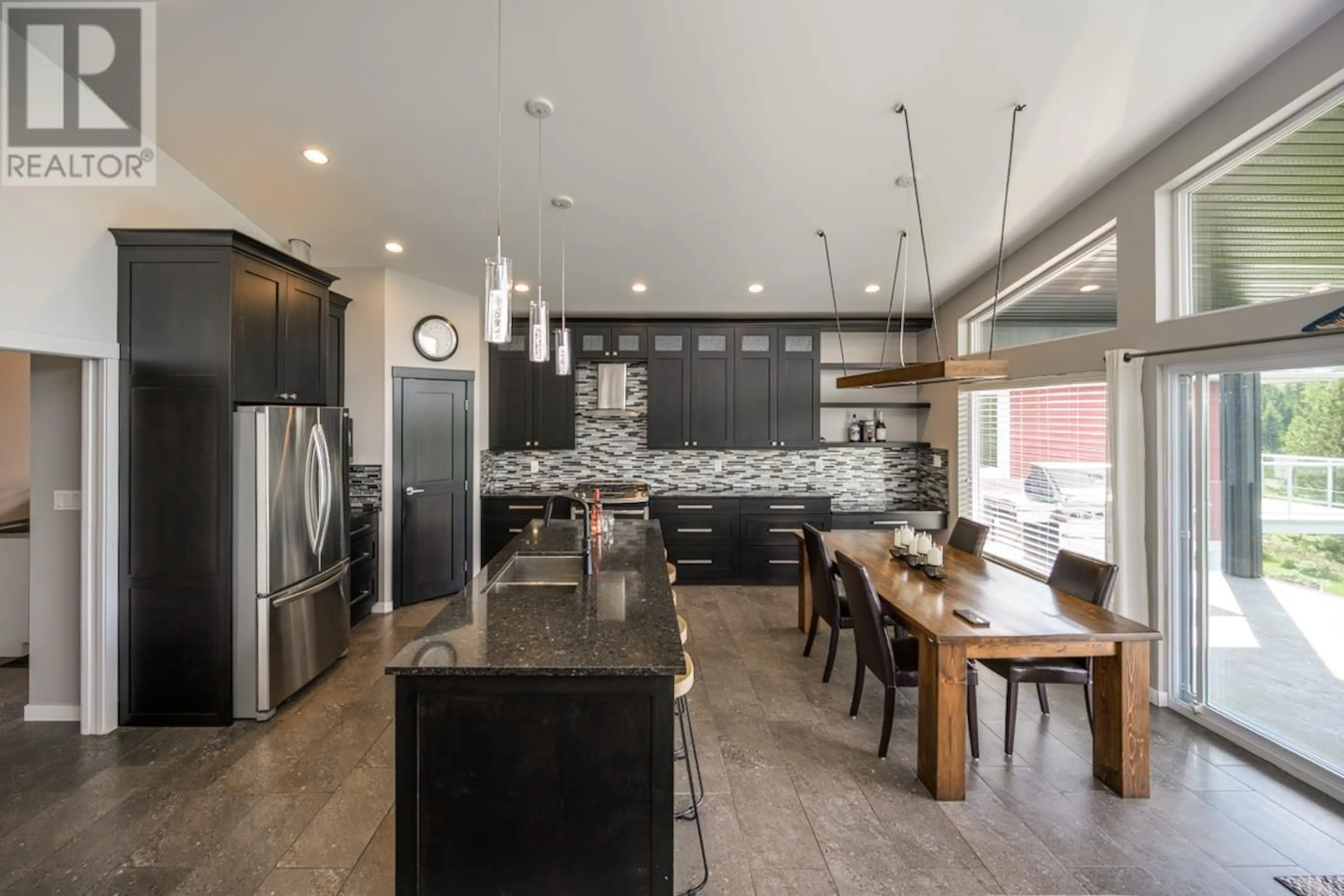 Open concept kitchen, ceramic/tile floor for 2418 MCTAVISH ROAD, Prince George British Columbia V2K0A1