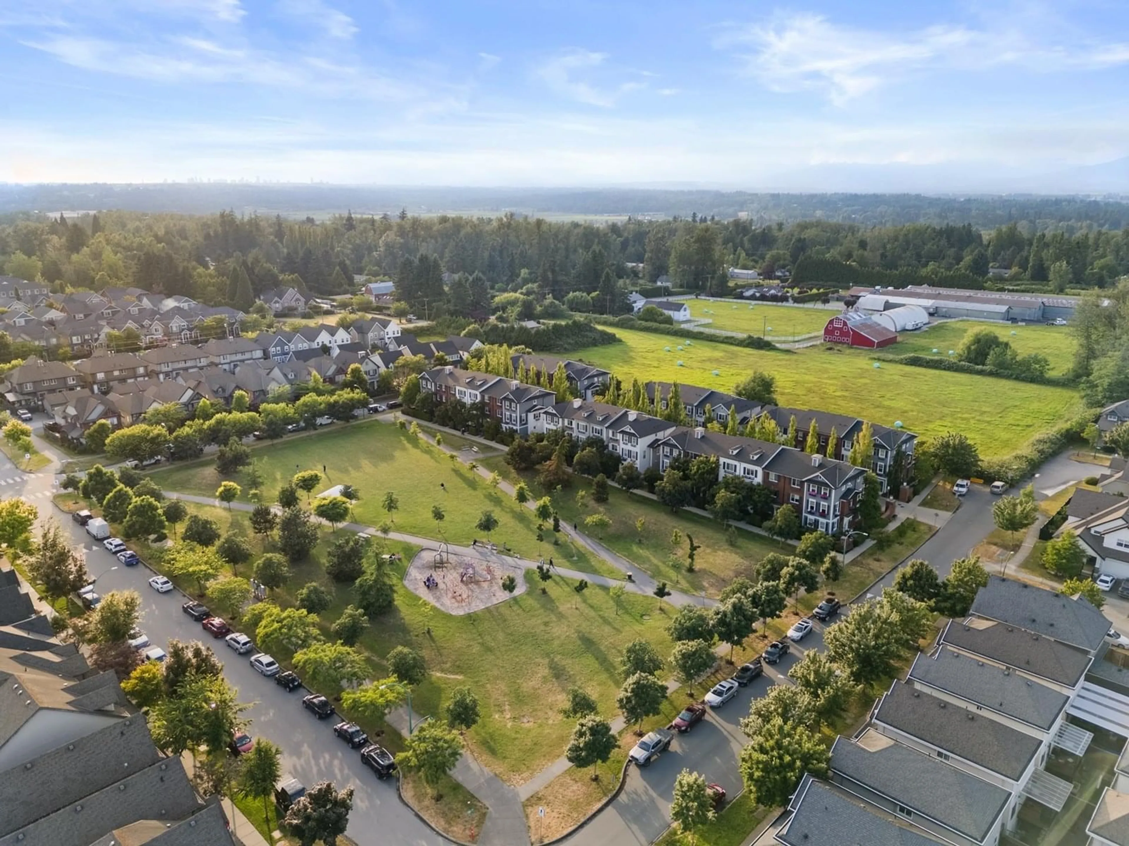 A pic from outside/outdoor area/front of a property/back of a property/a pic from drone, mountain view for 10 - 7348 192A, Surrey British Columbia V4N6J2