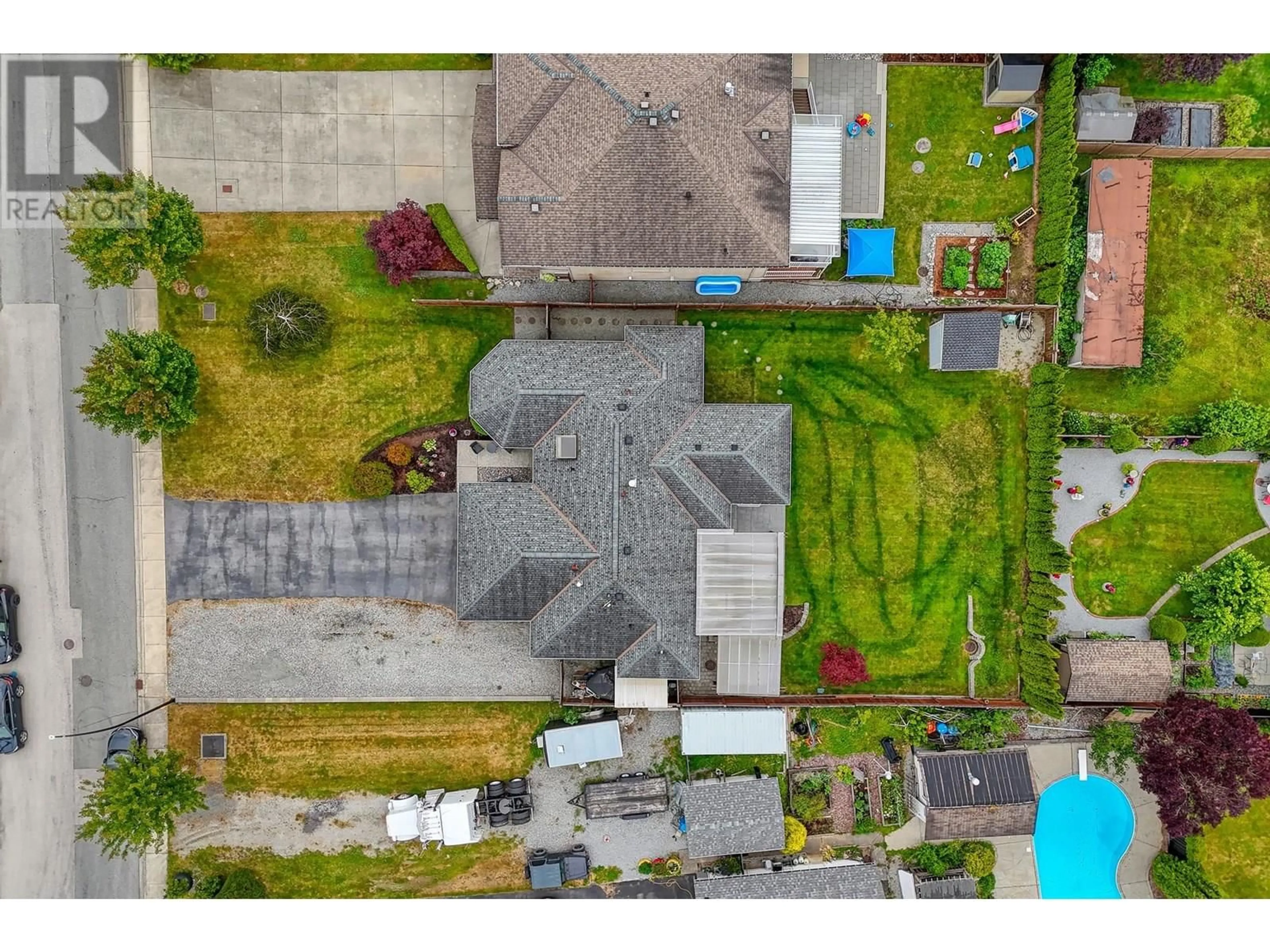A pic from outside/outdoor area/front of a property/back of a property/a pic from drone, street for 10579 245B STREET, Maple Ridge British Columbia V2W1G5