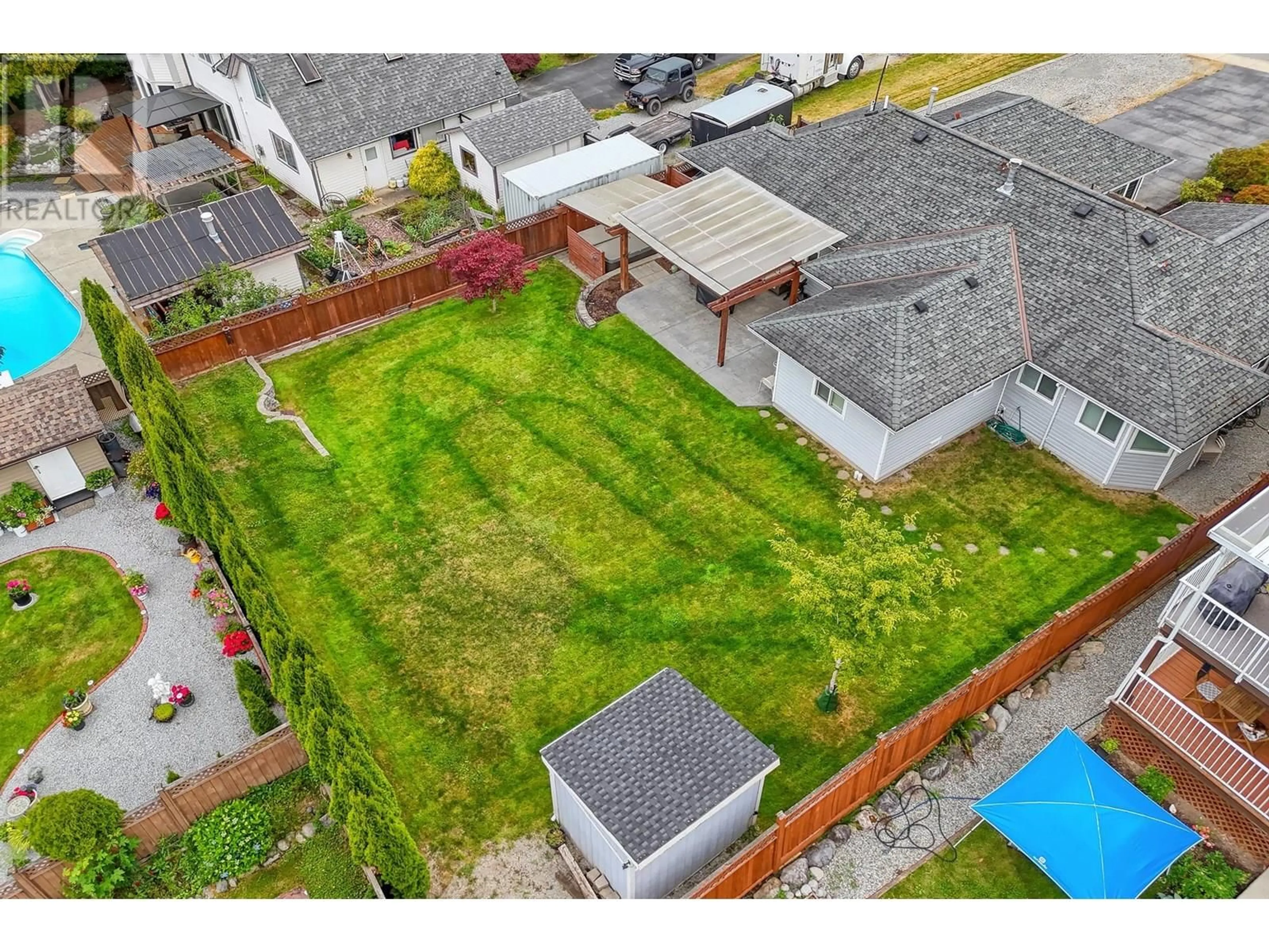 A pic from outside/outdoor area/front of a property/back of a property/a pic from drone, street for 10579 245B STREET, Maple Ridge British Columbia V2W1G5