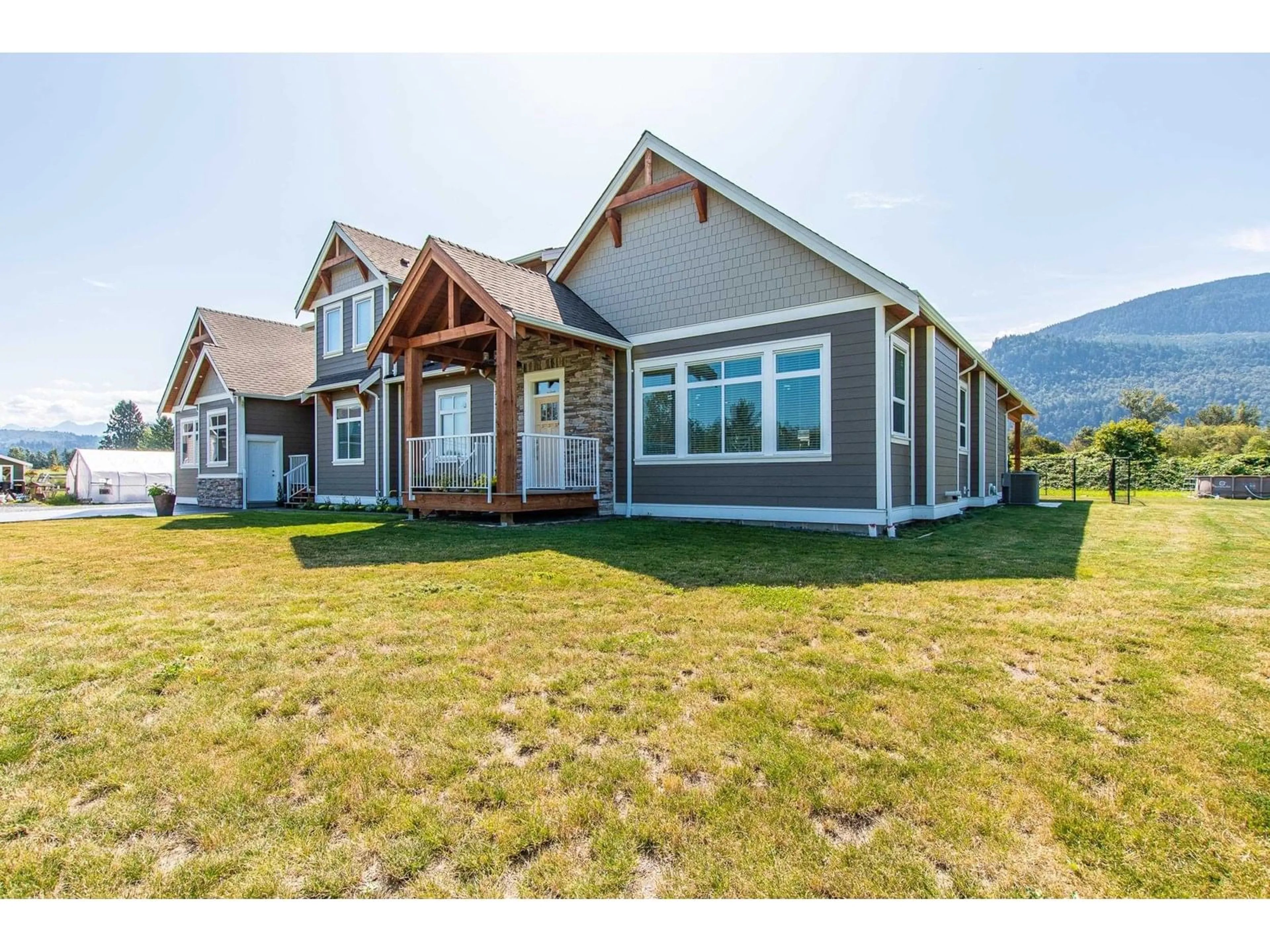 Home with vinyl exterior material, mountain view for 43832 KEITH WILSON ROAD, Chilliwack British Columbia V2R4B5