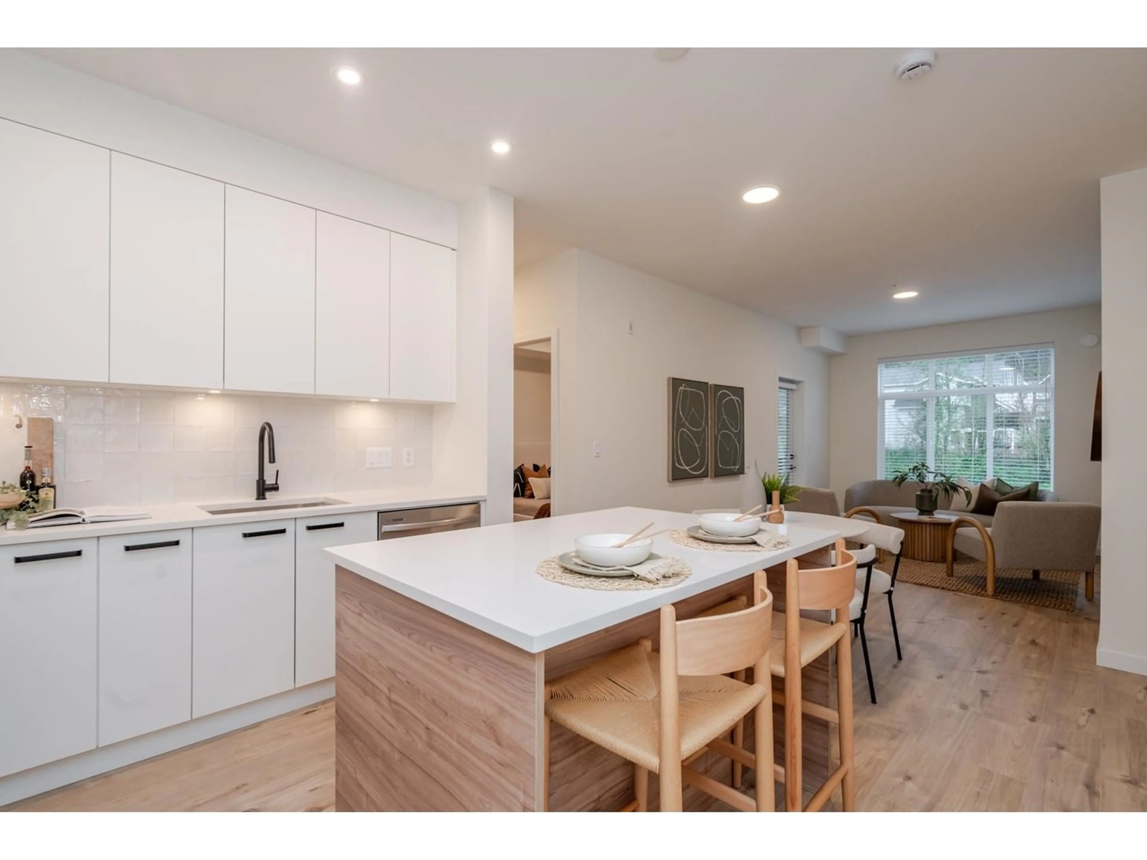 Open concept kitchen, wood/laminate floor for 202 - 33920 BEST, Mission British Columbia V2V7A4