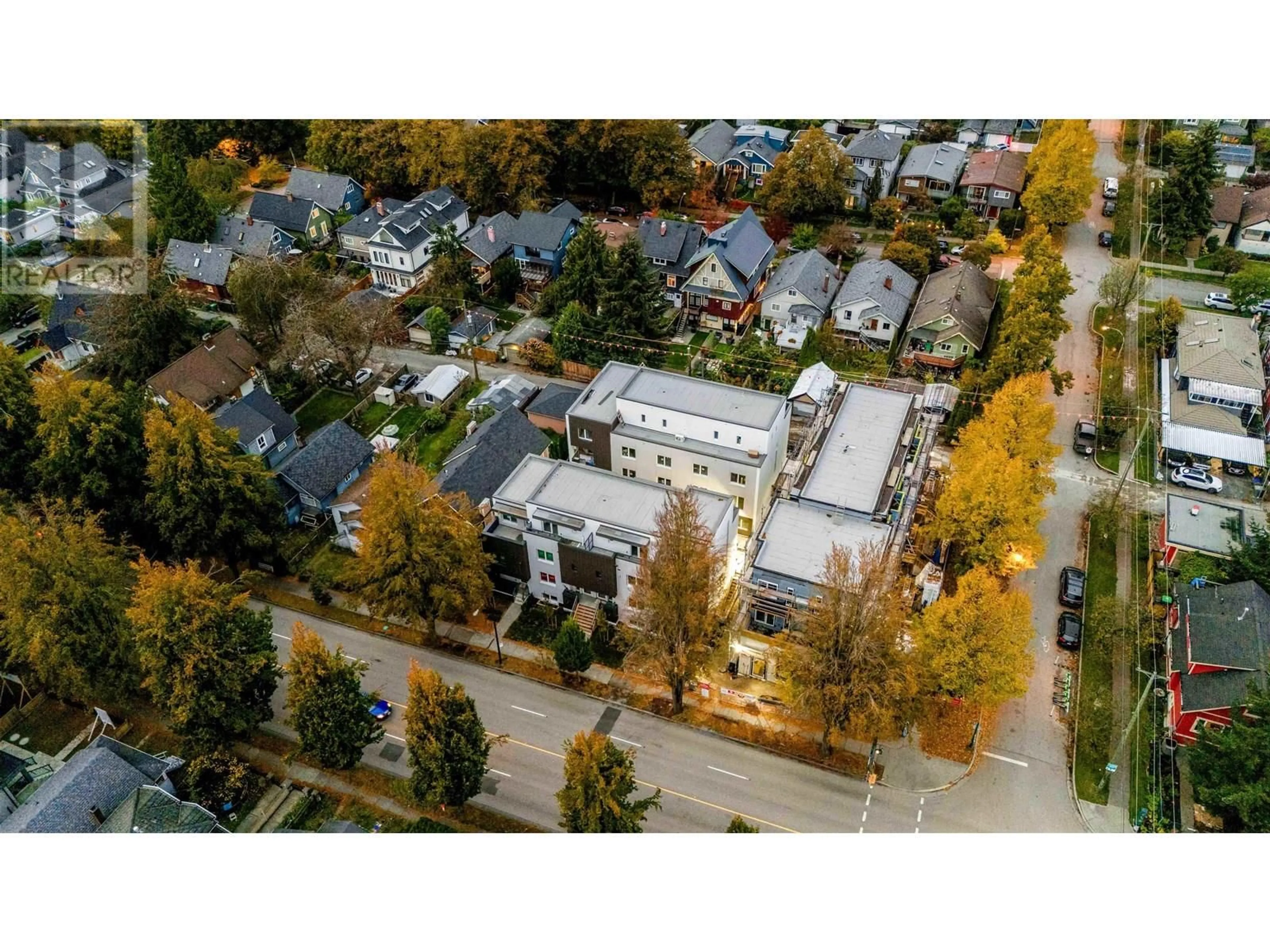 A pic from outside/outdoor area/front of a property/back of a property/a pic from drone, street for 2069 1ST AVENUE, Vancouver British Columbia V5N1B6