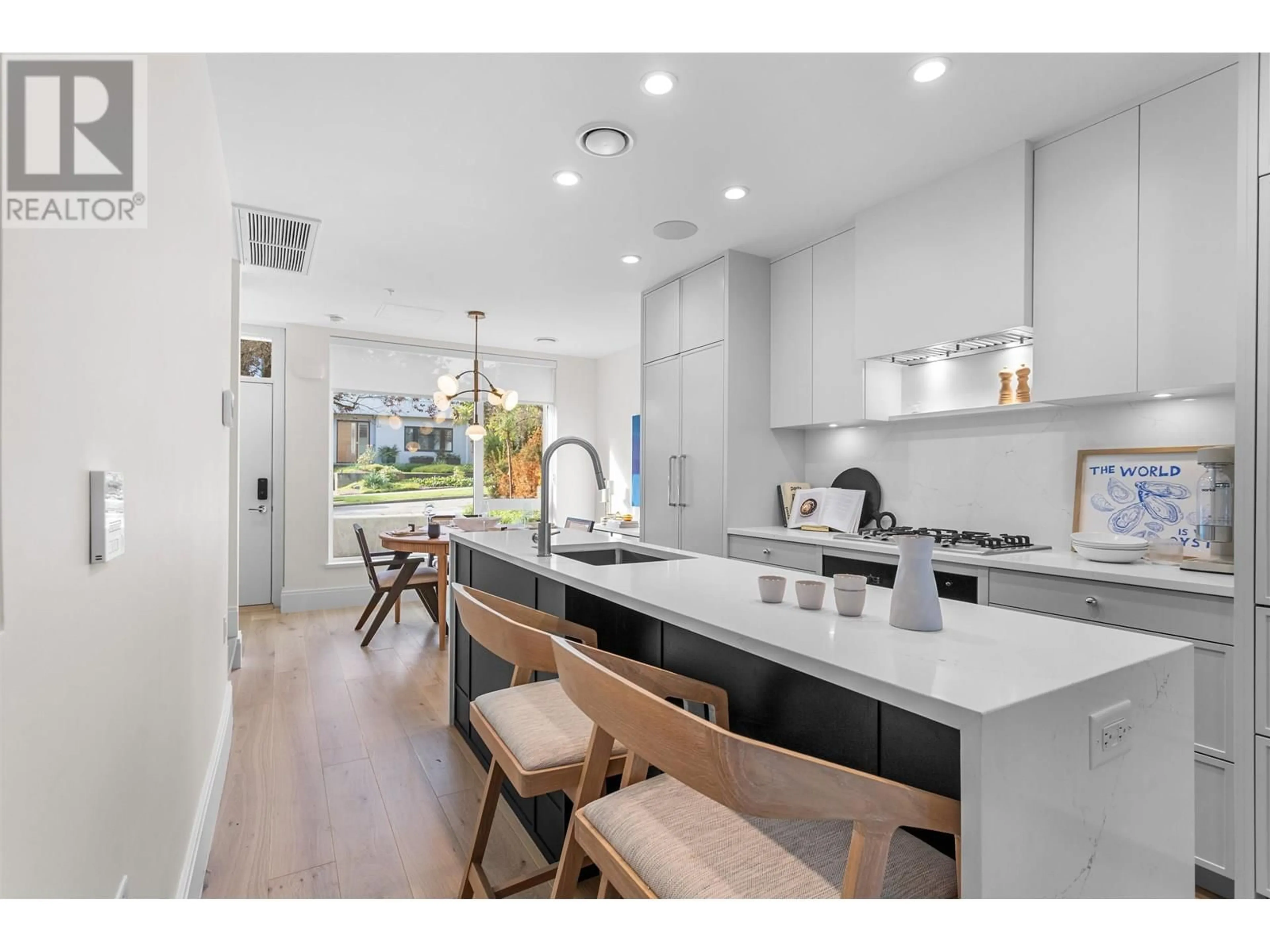 Open concept kitchen, ceramic/tile floor for 557 26TH AVENUE, Vancouver British Columbia V5Z2E4
