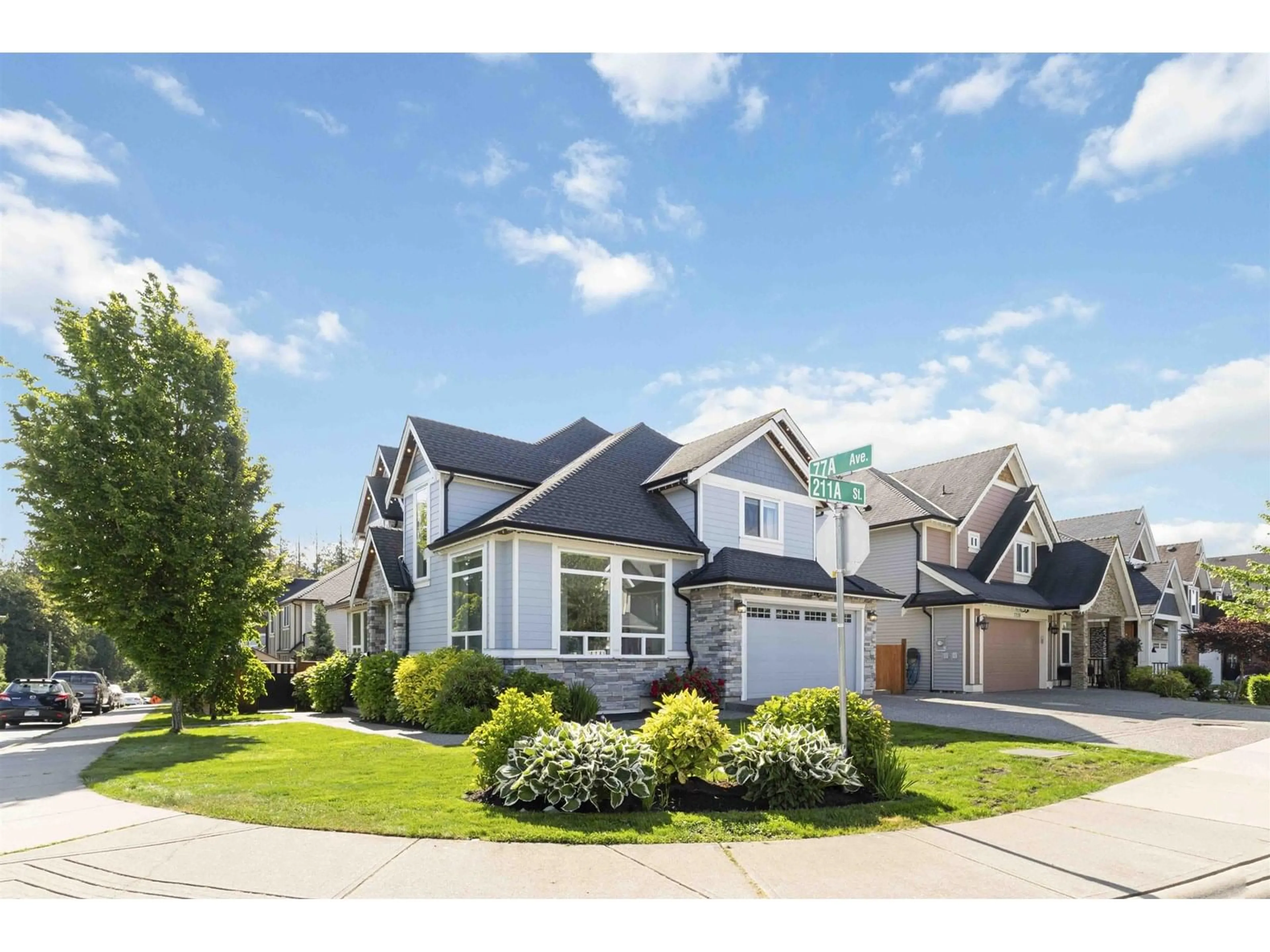 Home with vinyl exterior material, street for 21156 77A, Langley British Columbia V2Y0K7