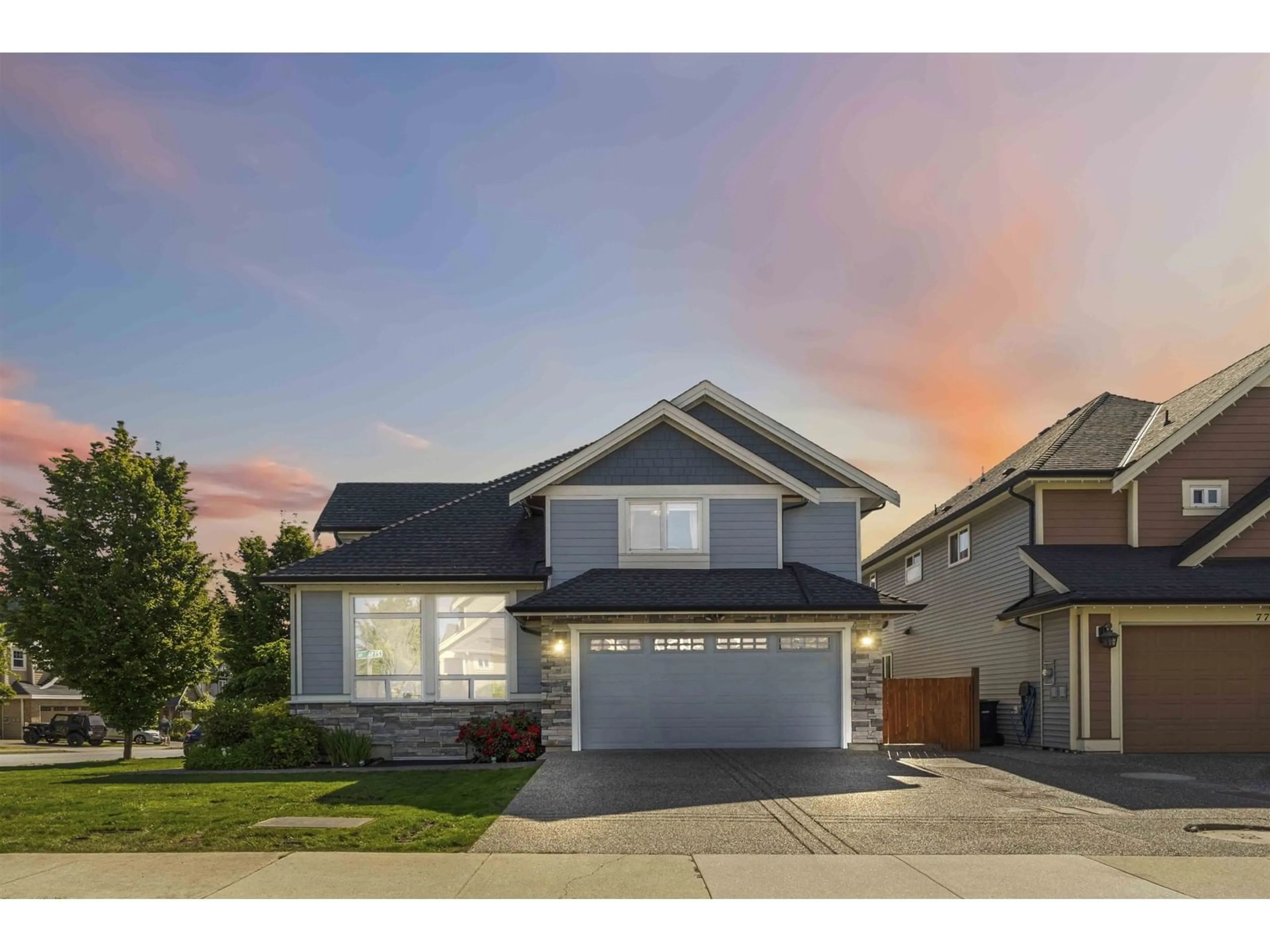 Home with vinyl exterior material, street for 21156 77A, Langley British Columbia V2Y0K7