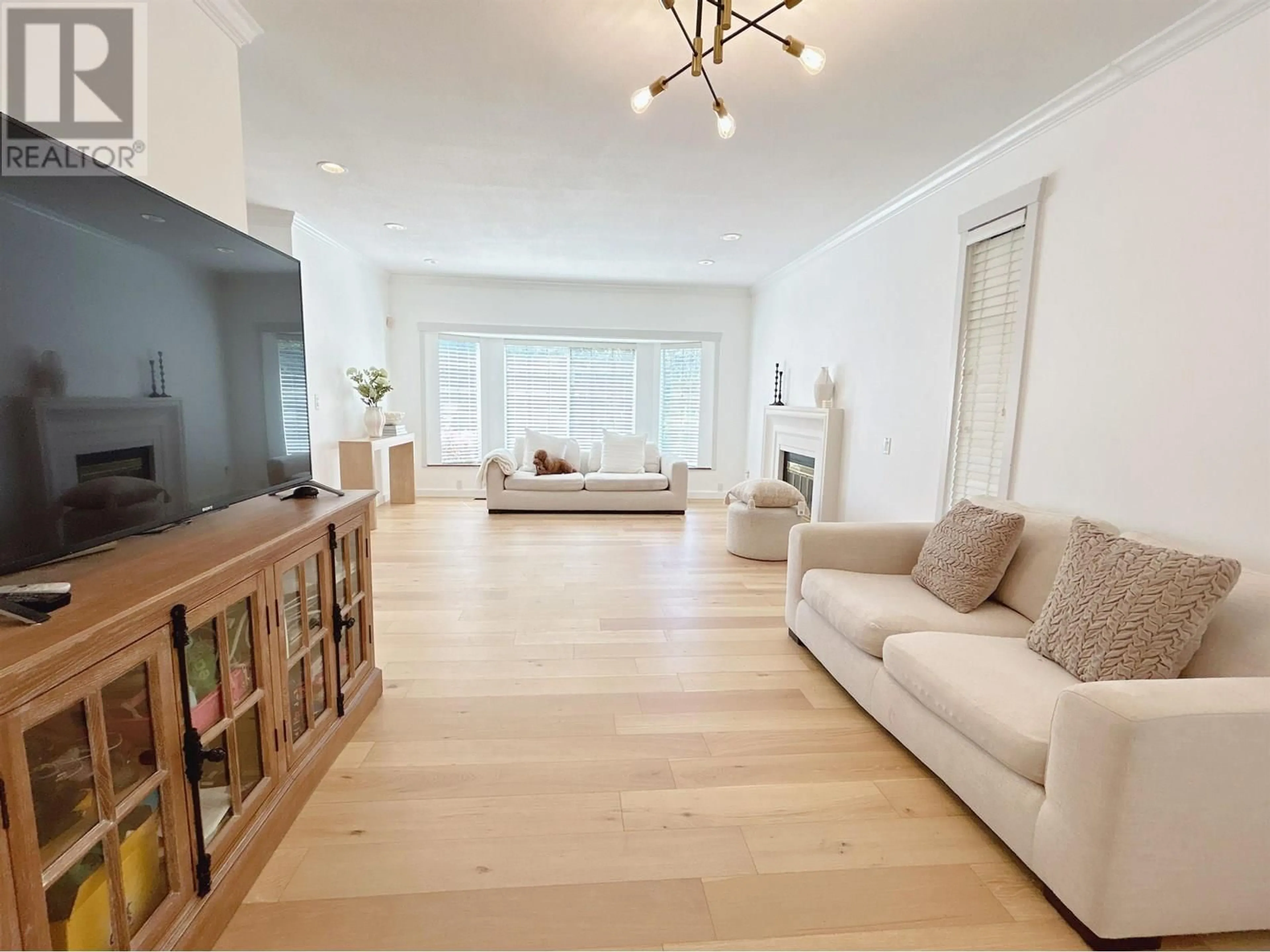 Living room with furniture, wood/laminate floor for 1611 57TH AVENUE, Vancouver British Columbia V5P2B3