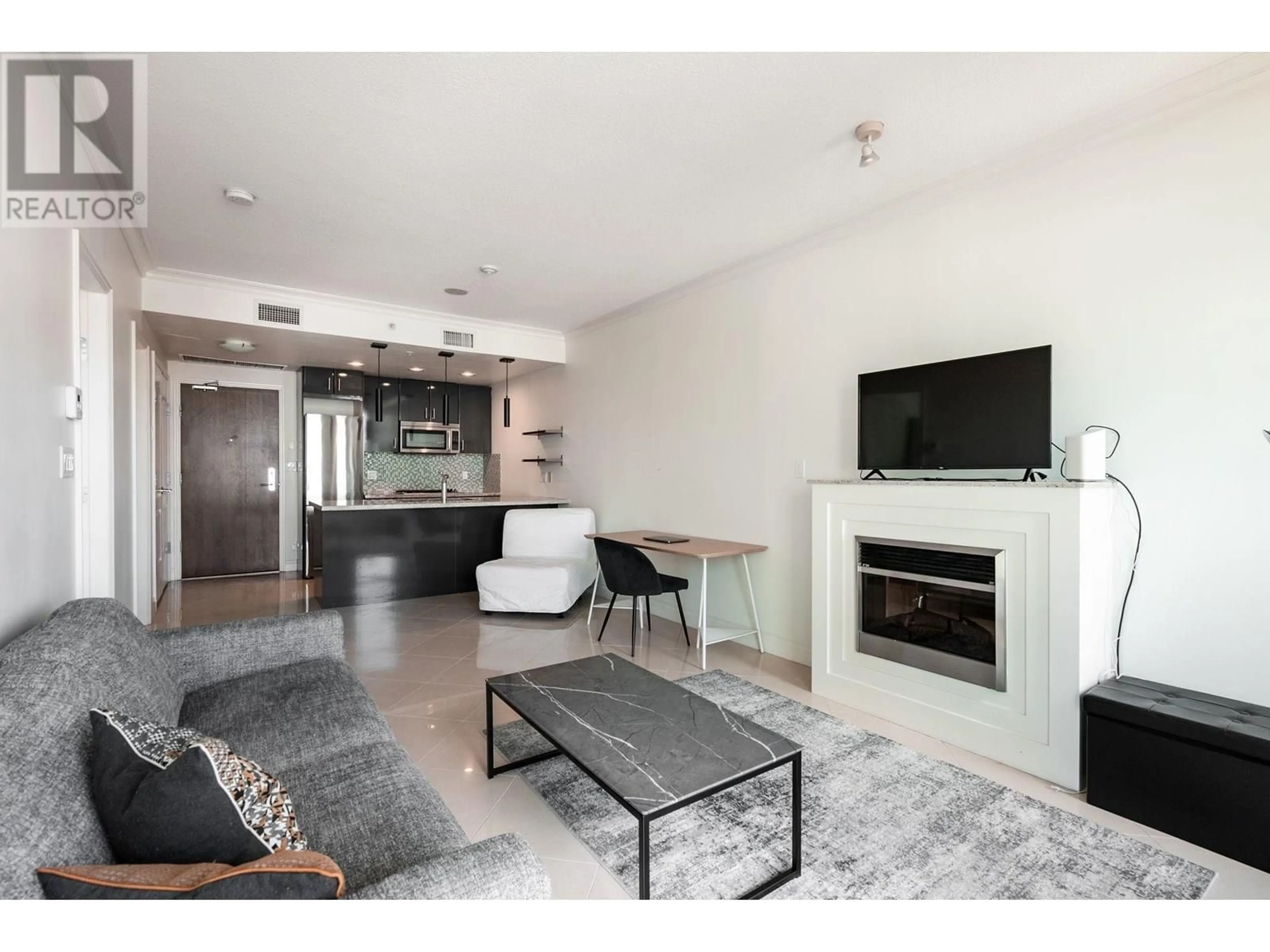 Living room with furniture, unknown for 707 - 162 VICTORY SHIP WAY, North Vancouver British Columbia V7L0B4