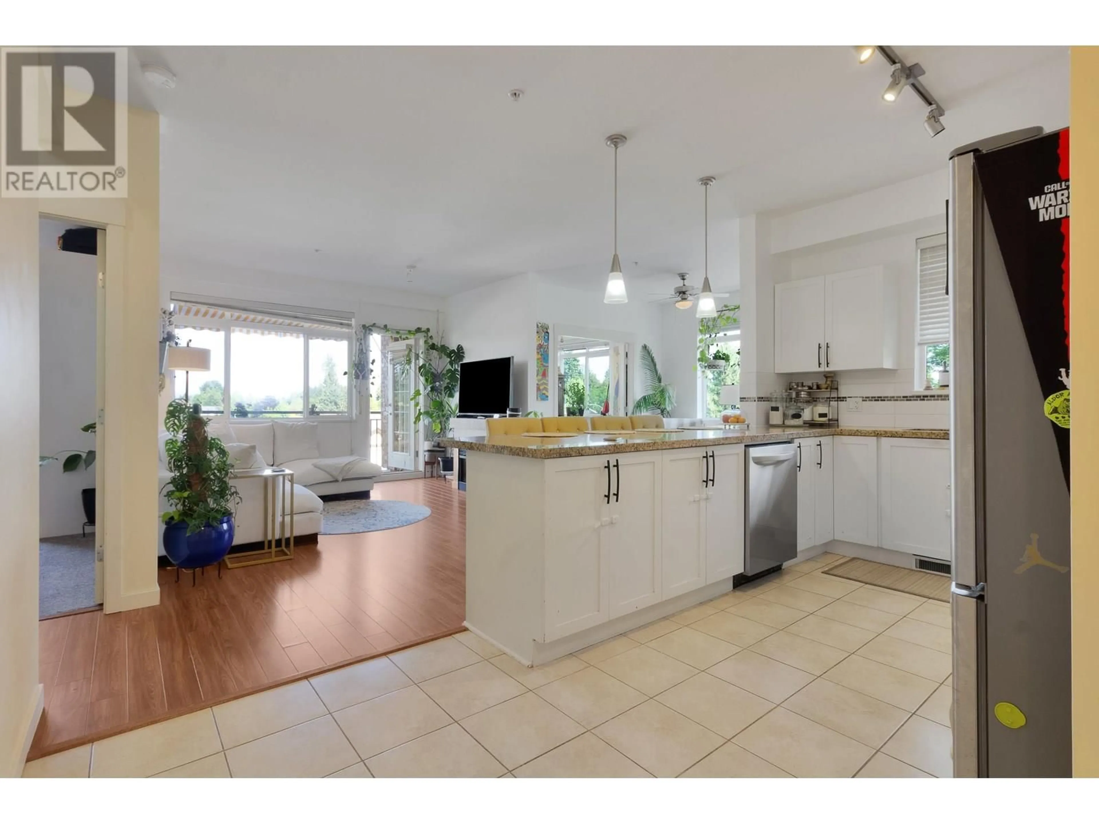 Open concept kitchen, ceramic/tile floor for 320 - 12350 HARRIS ROAD, Pitt Meadows British Columbia V3Y0C5