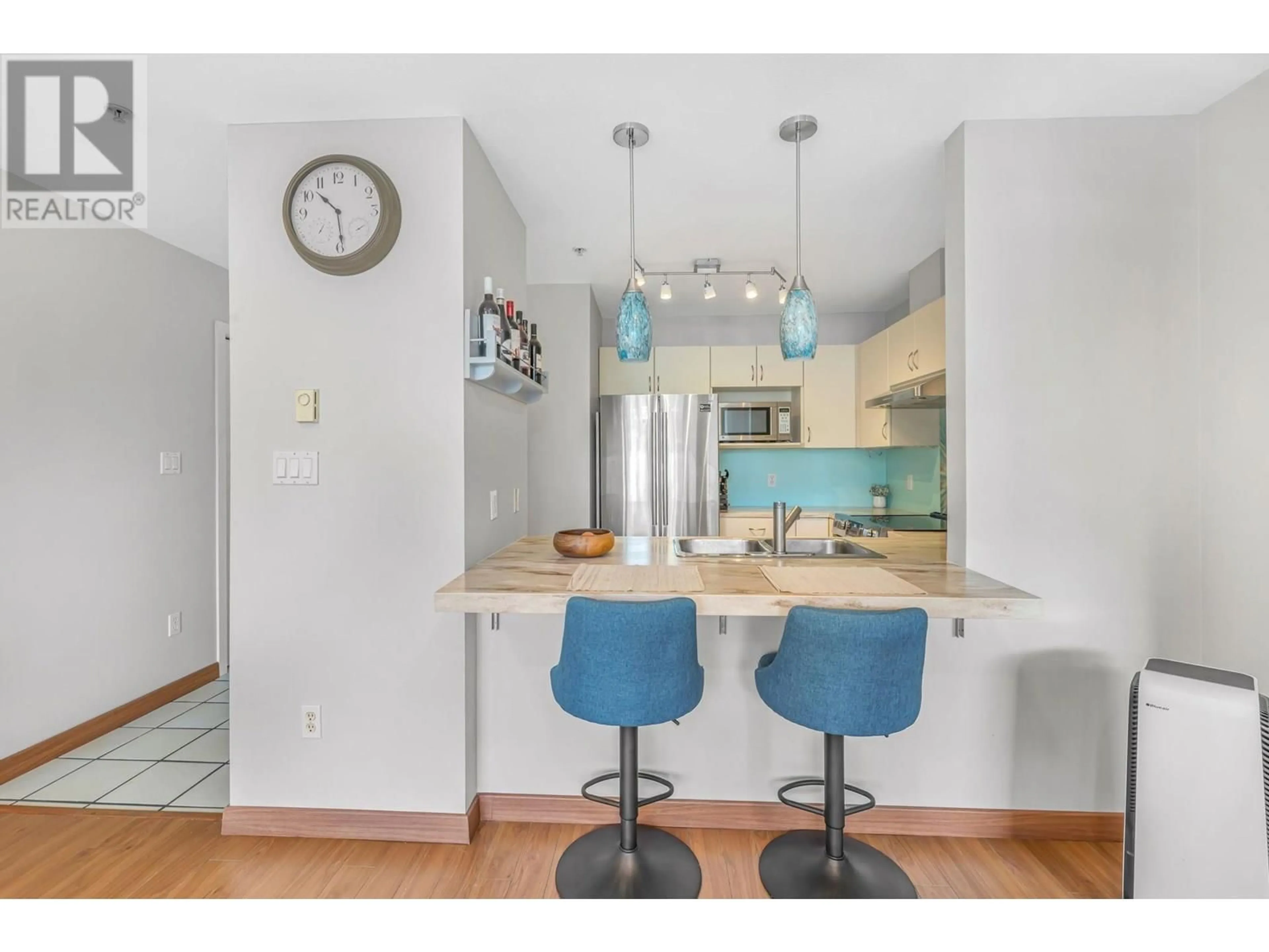 Open concept kitchen, unknown for 402 - 3161 4TH AVENUE, Vancouver British Columbia V6K1R6