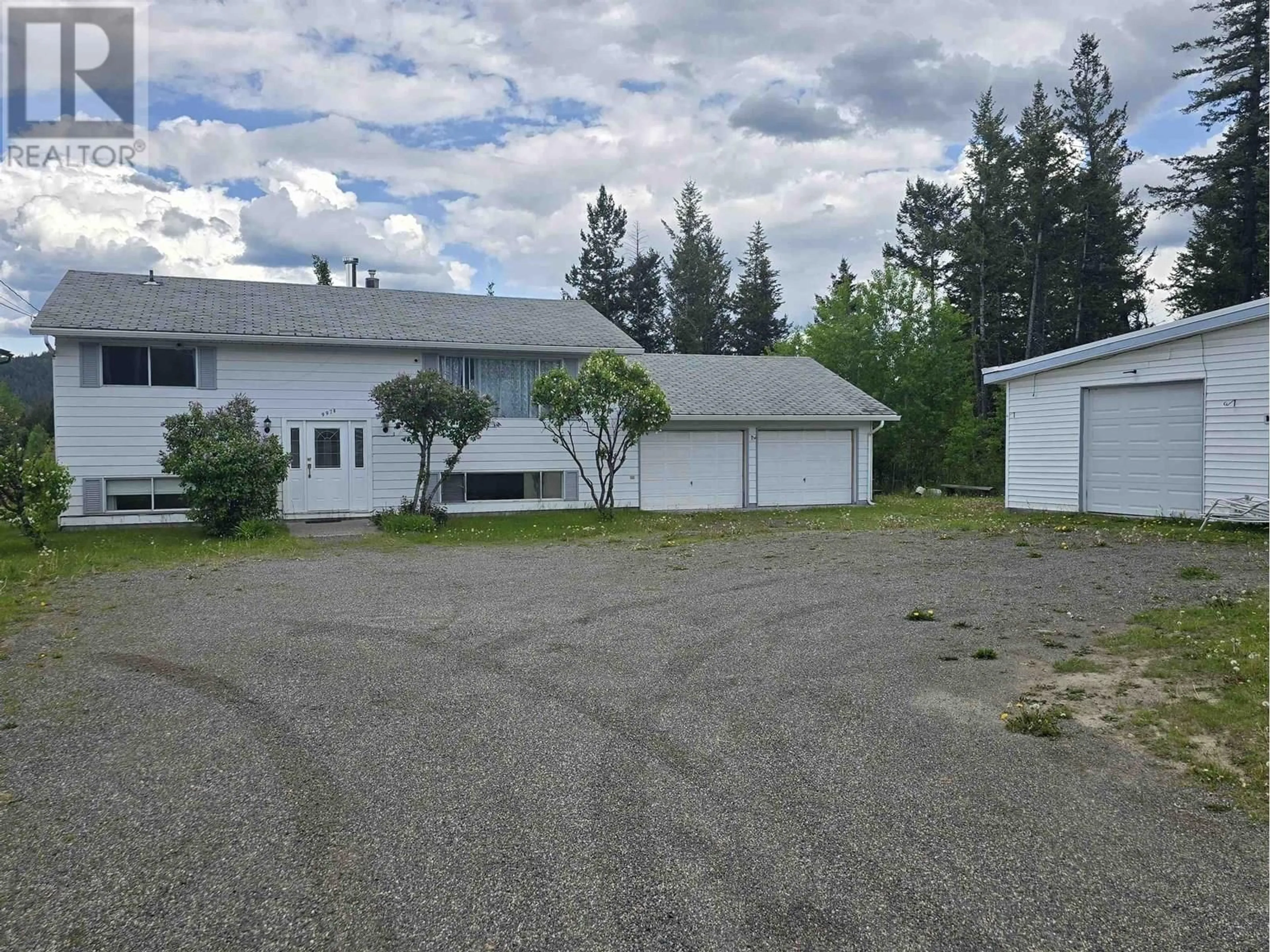 A pic from outside/outdoor area/front of a property/back of a property/a pic from drone, street for 997 ALDER AVENUE, 100 Mile House British Columbia V0K2E0