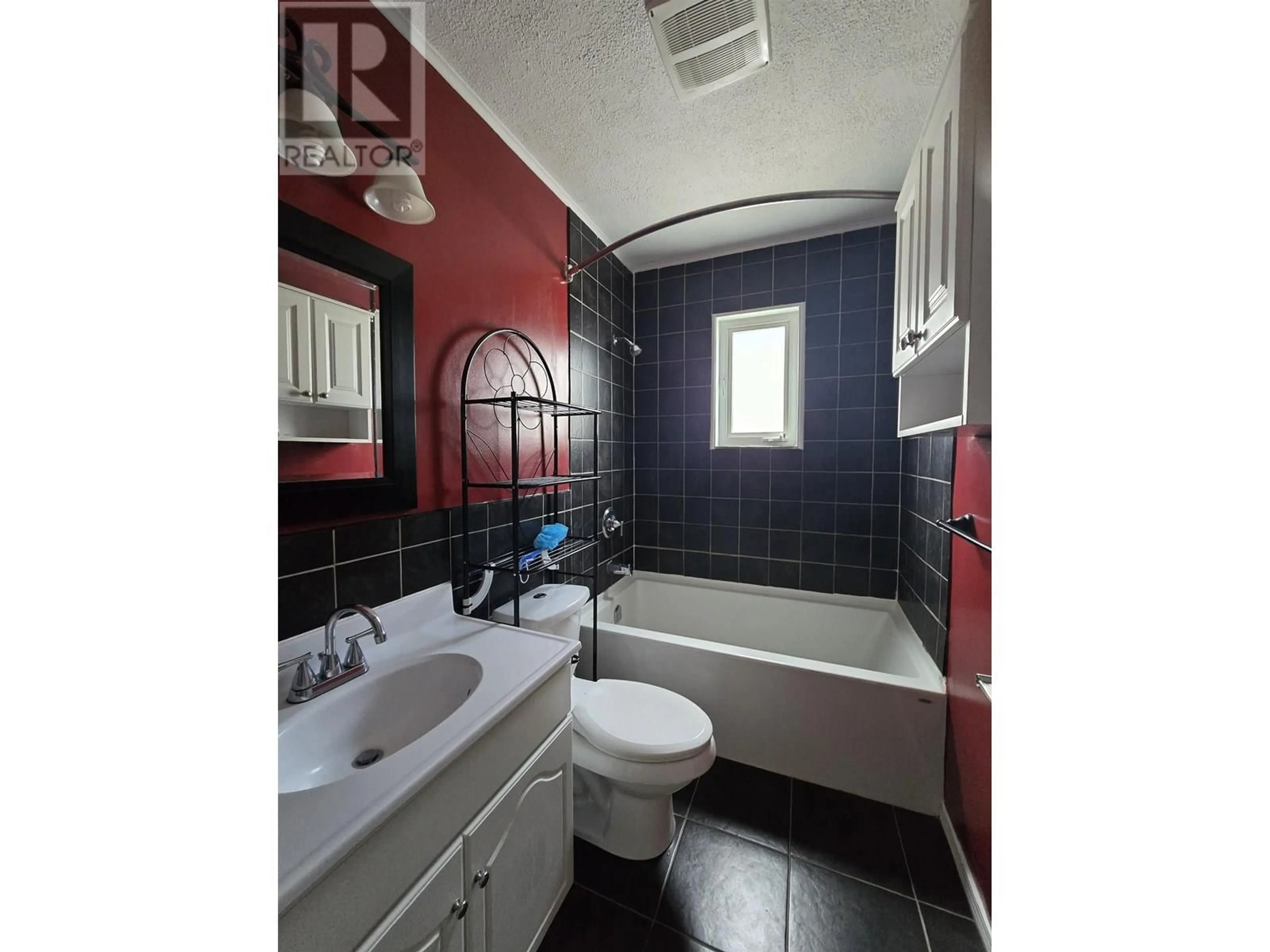 Standard bathroom, ceramic/tile floor for 997 ALDER AVENUE, 100 Mile House British Columbia V0K2E0
