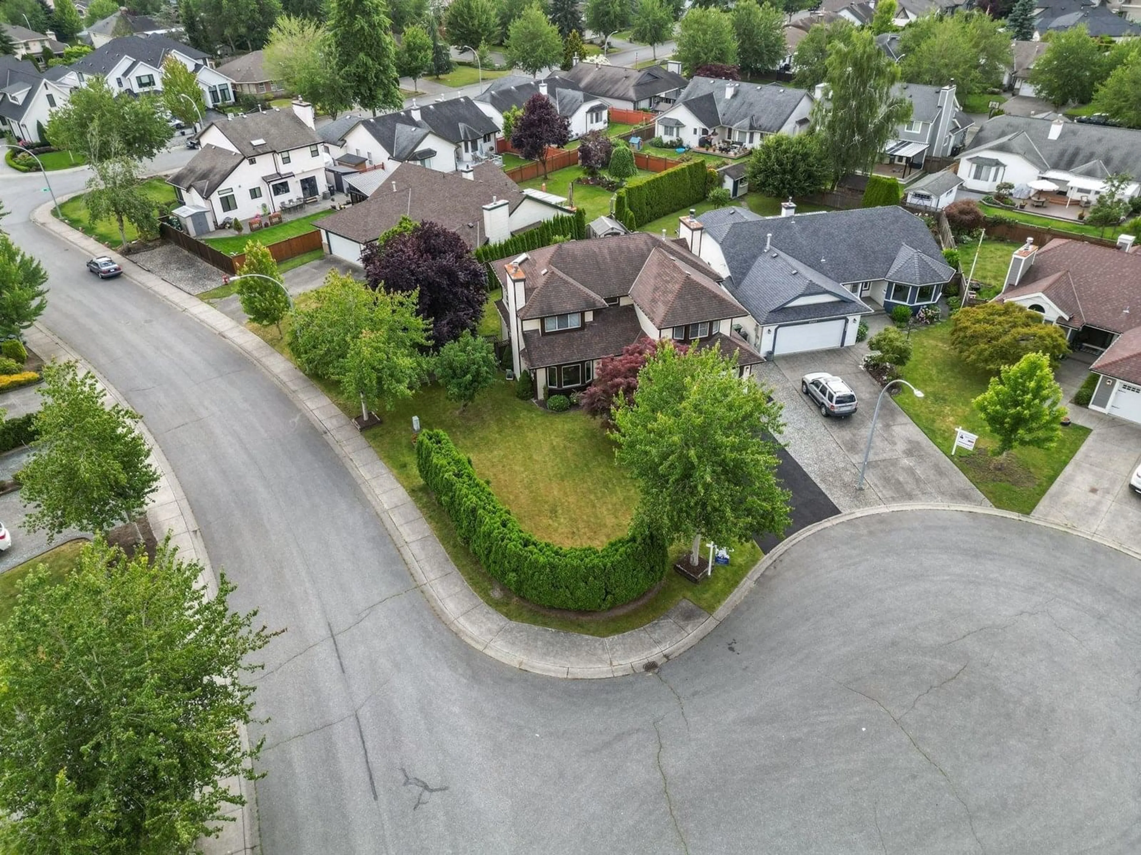 A pic from outside/outdoor area/front of a property/back of a property/a pic from drone, street for 4543 220, Langley British Columbia V3A9H3