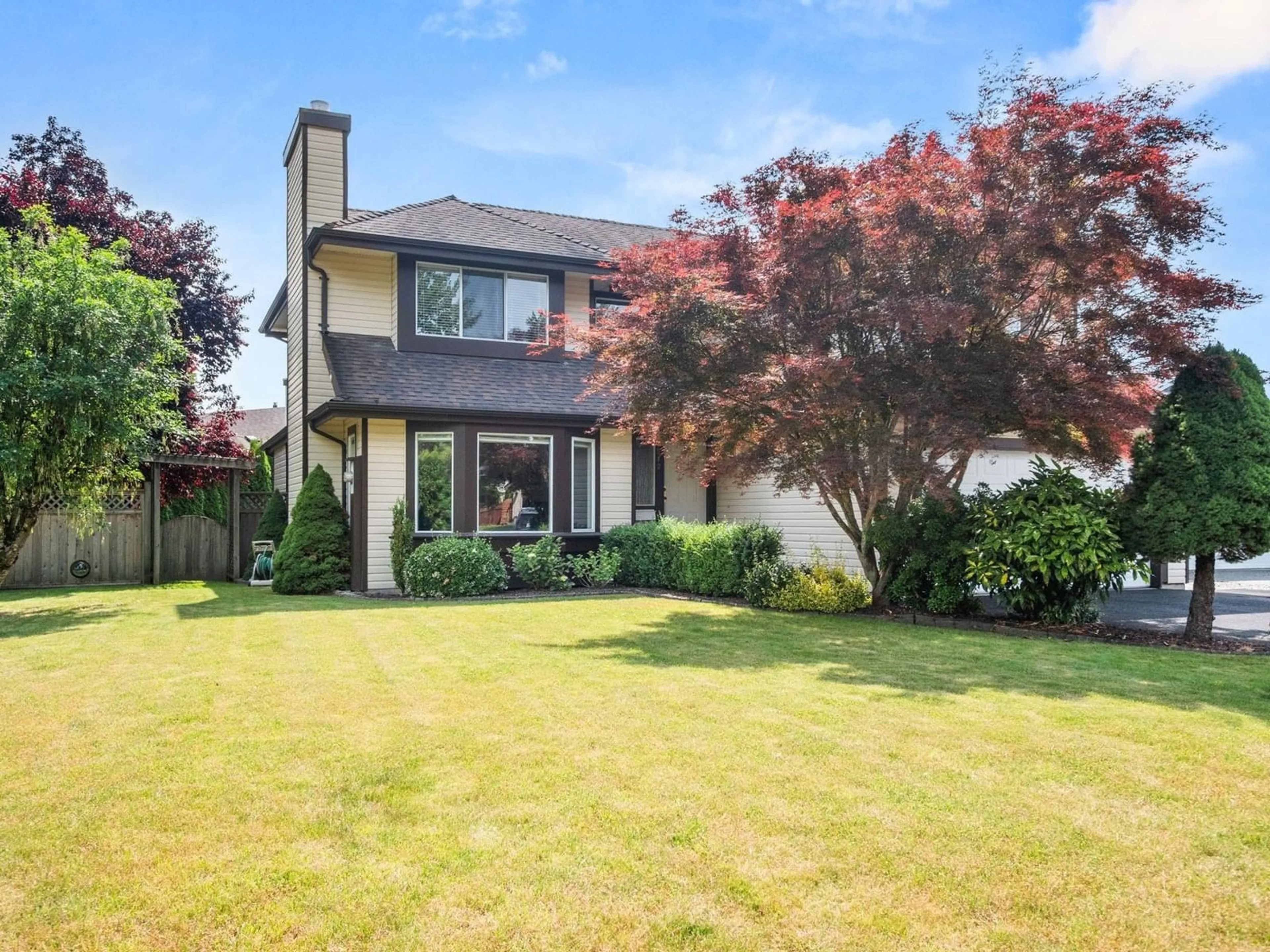 Home with vinyl exterior material, street for 4543 220, Langley British Columbia V3A9H3