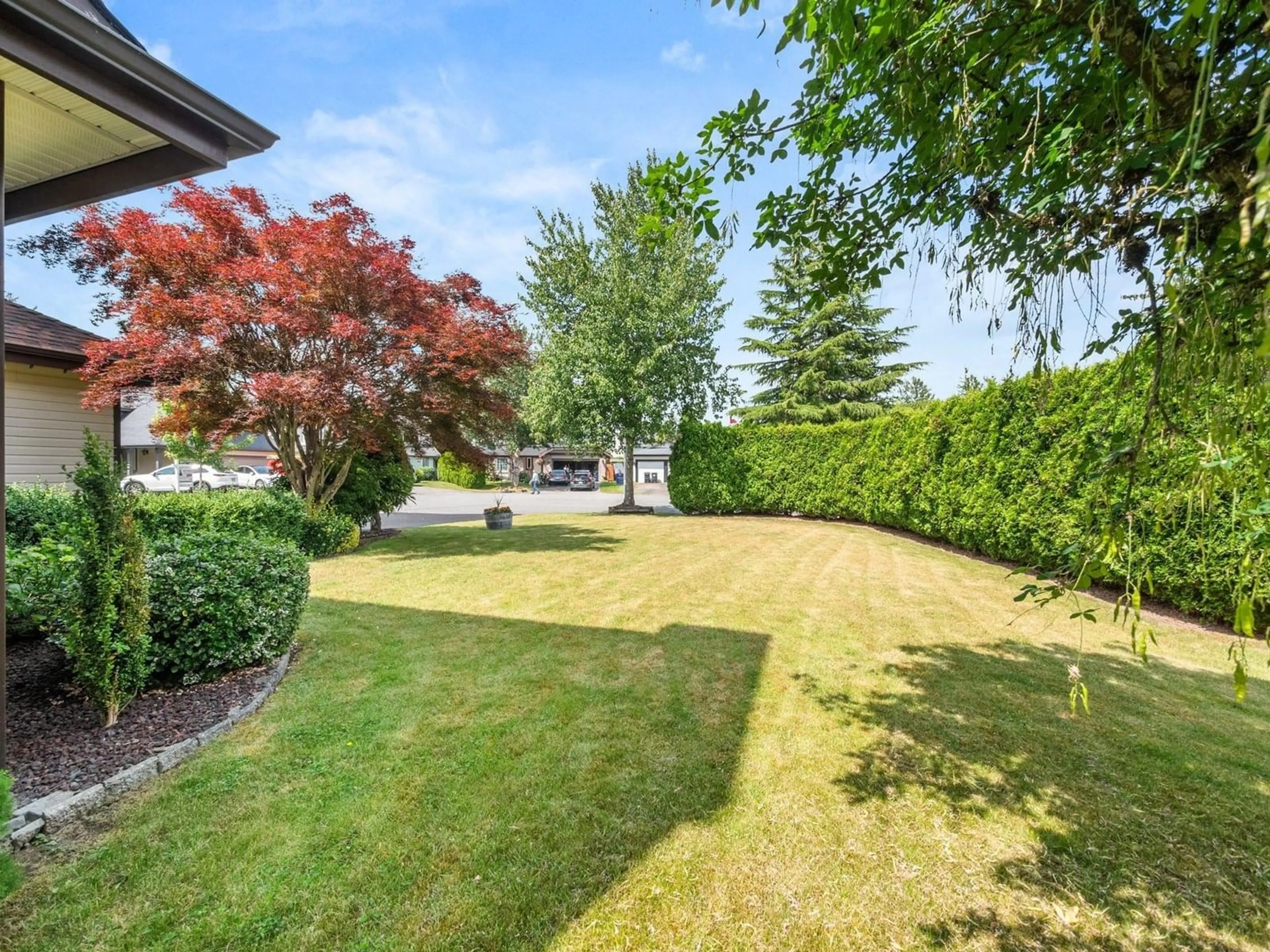 A pic from outside/outdoor area/front of a property/back of a property/a pic from drone, unknown for 4543 220, Langley British Columbia V3A9H3