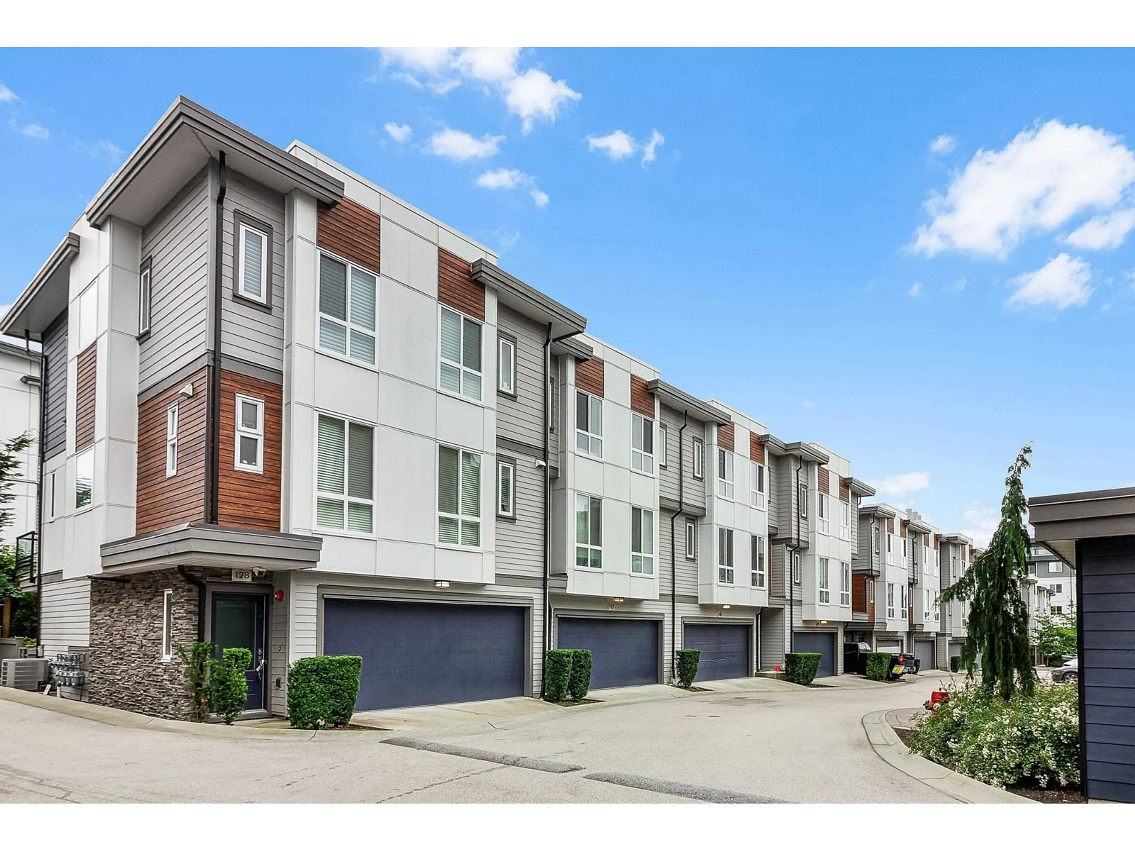A pic from outside/outdoor area/front of a property/back of a property/a pic from drone, street for 127 - 7947 209, Langley British Columbia V2Y2C8