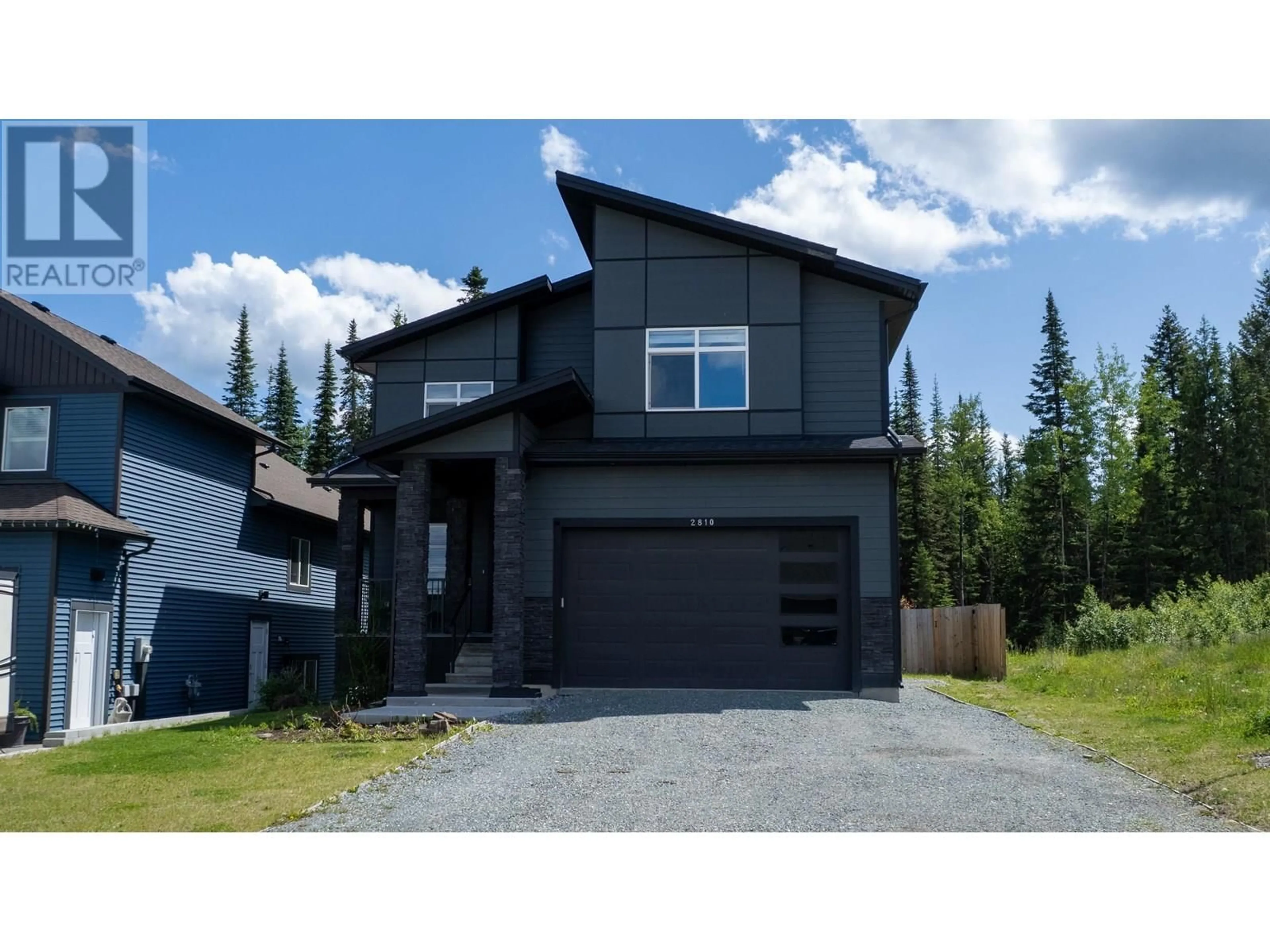 Home with vinyl exterior material, street for 2810 VISTA RIDGE DRIVE, Prince George British Columbia V2N0G9