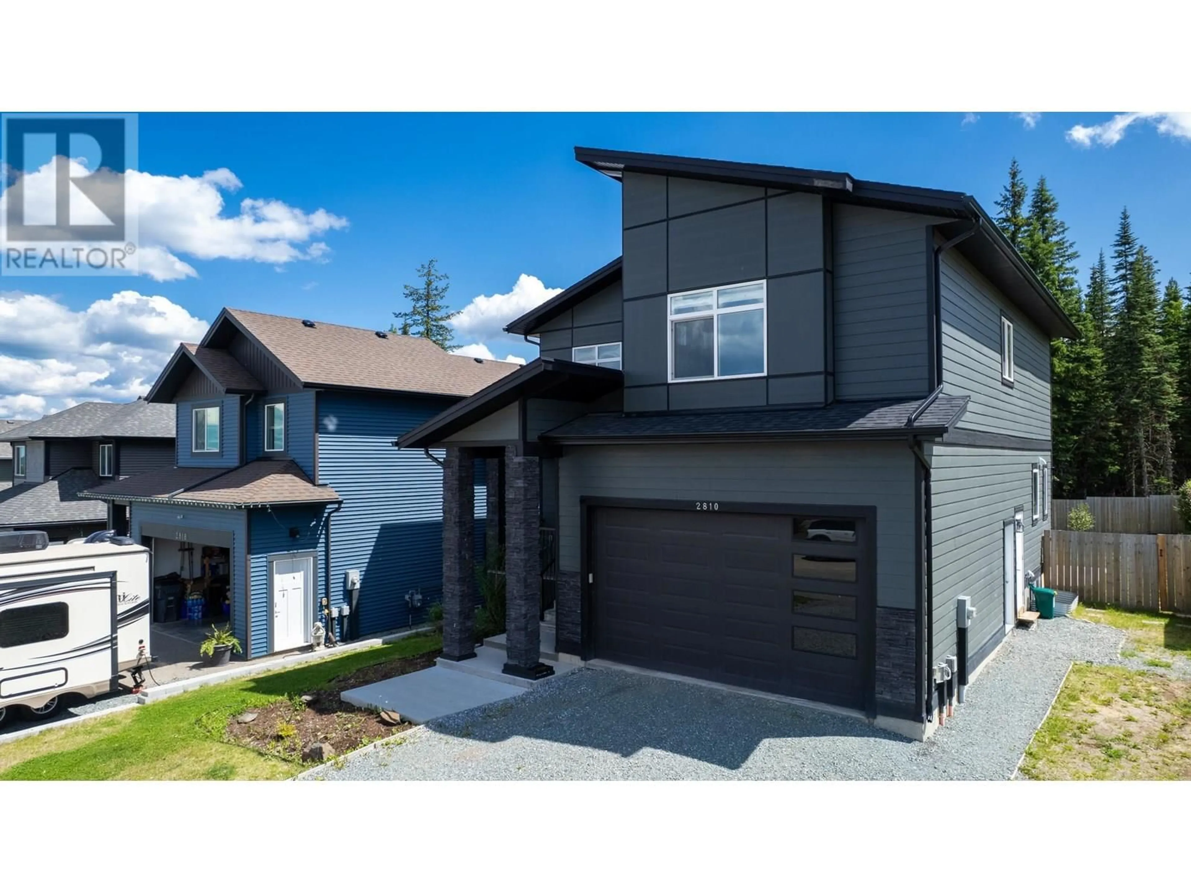 Home with vinyl exterior material, street for 2810 VISTA RIDGE DRIVE, Prince George British Columbia V2N0G9
