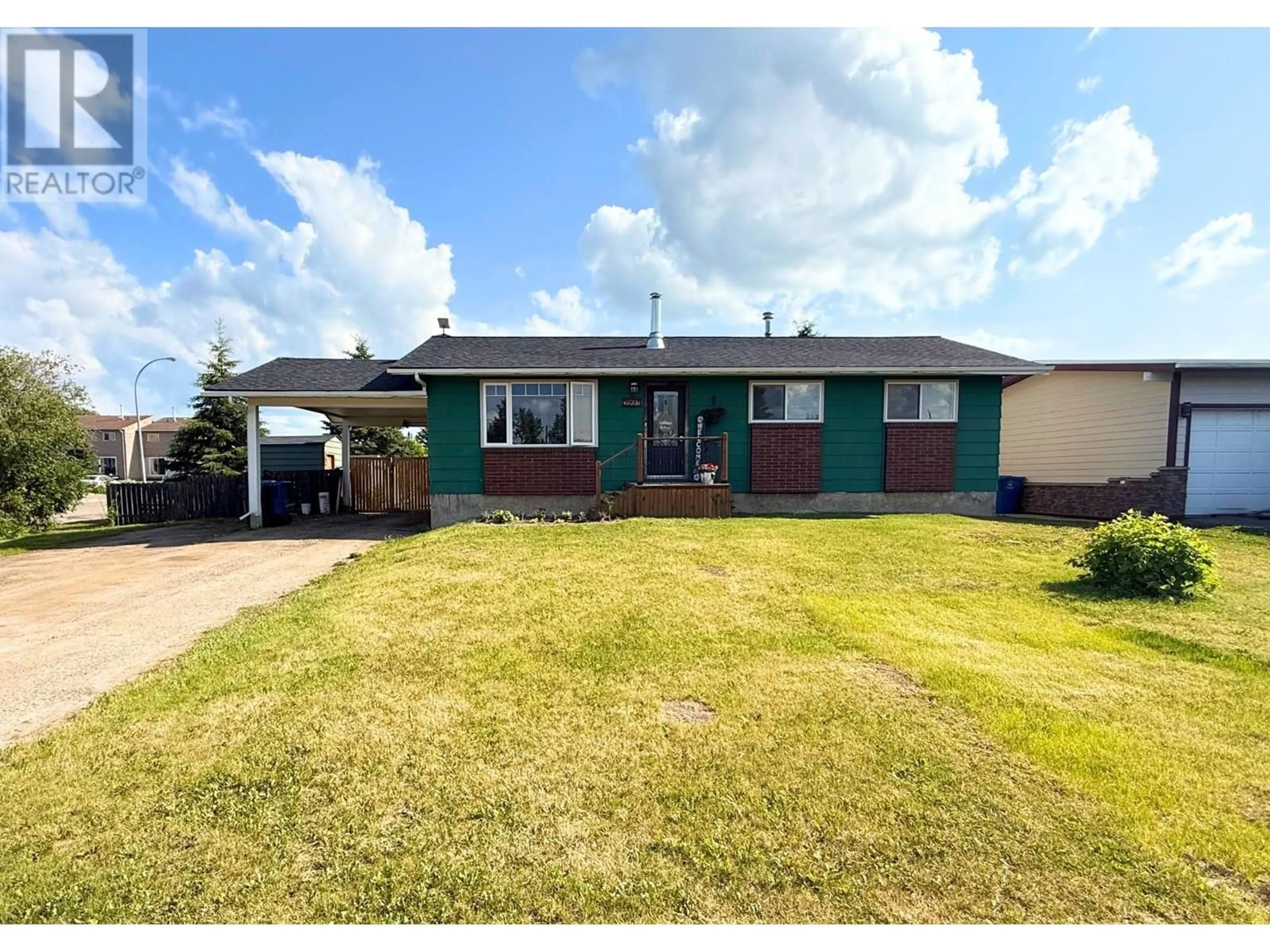 A pic from outside/outdoor area/front of a property/back of a property/a pic from drone, street for 9007 103A AVENUE, Fort St. John British Columbia V1J2J4