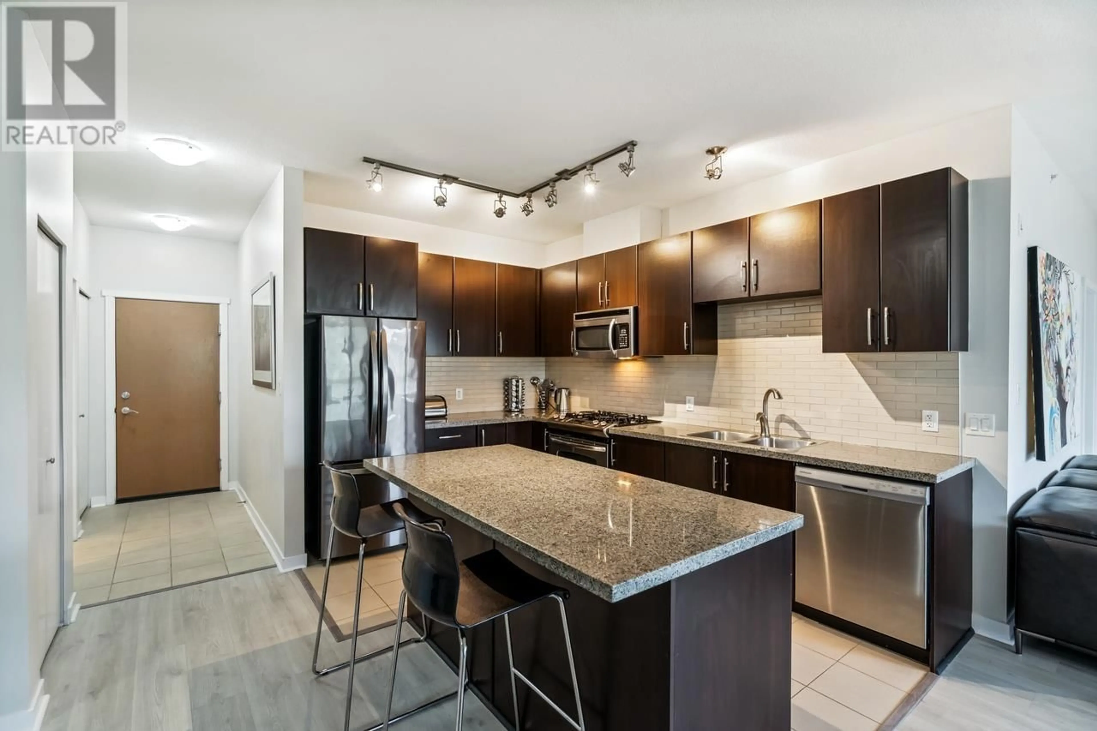 Open concept kitchen, ceramic/tile floor for 413 - 701 KLAHANIE DRIVE, Port Moody British Columbia V3H5L6