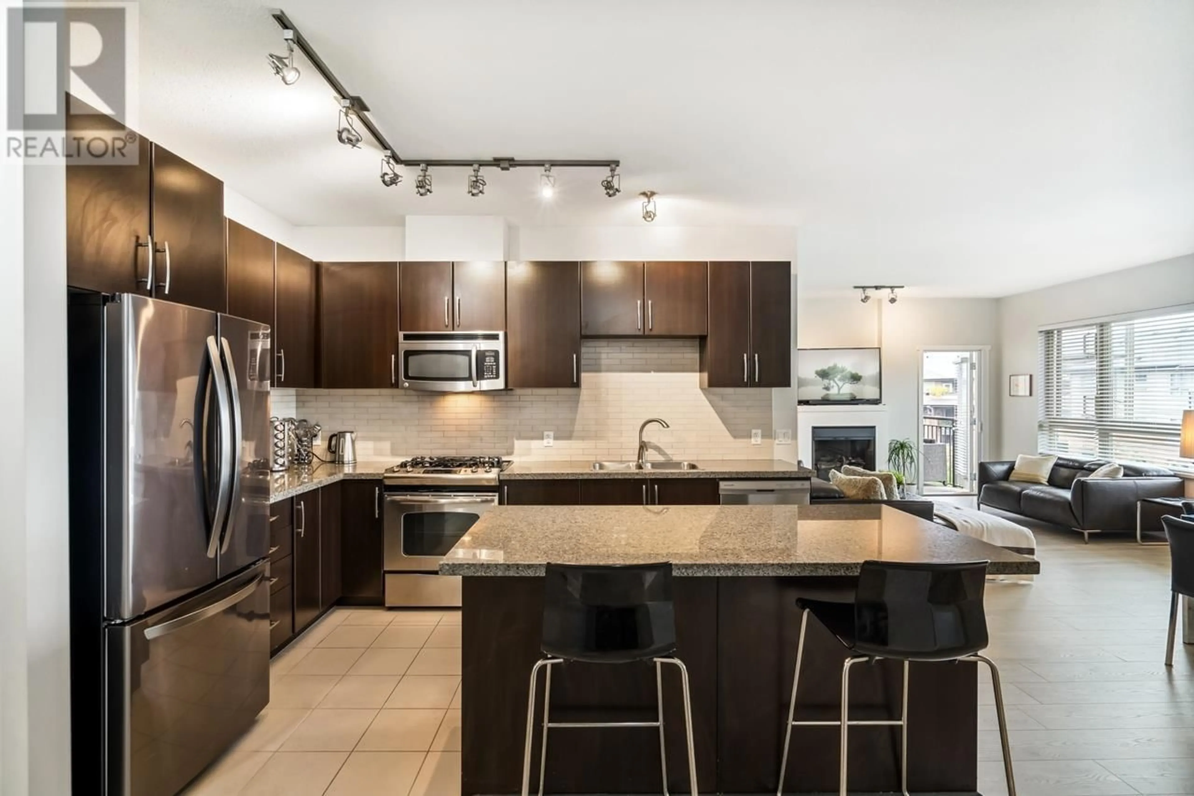 Open concept kitchen, ceramic/tile floor for 413 - 701 KLAHANIE DRIVE, Port Moody British Columbia V3H5L6