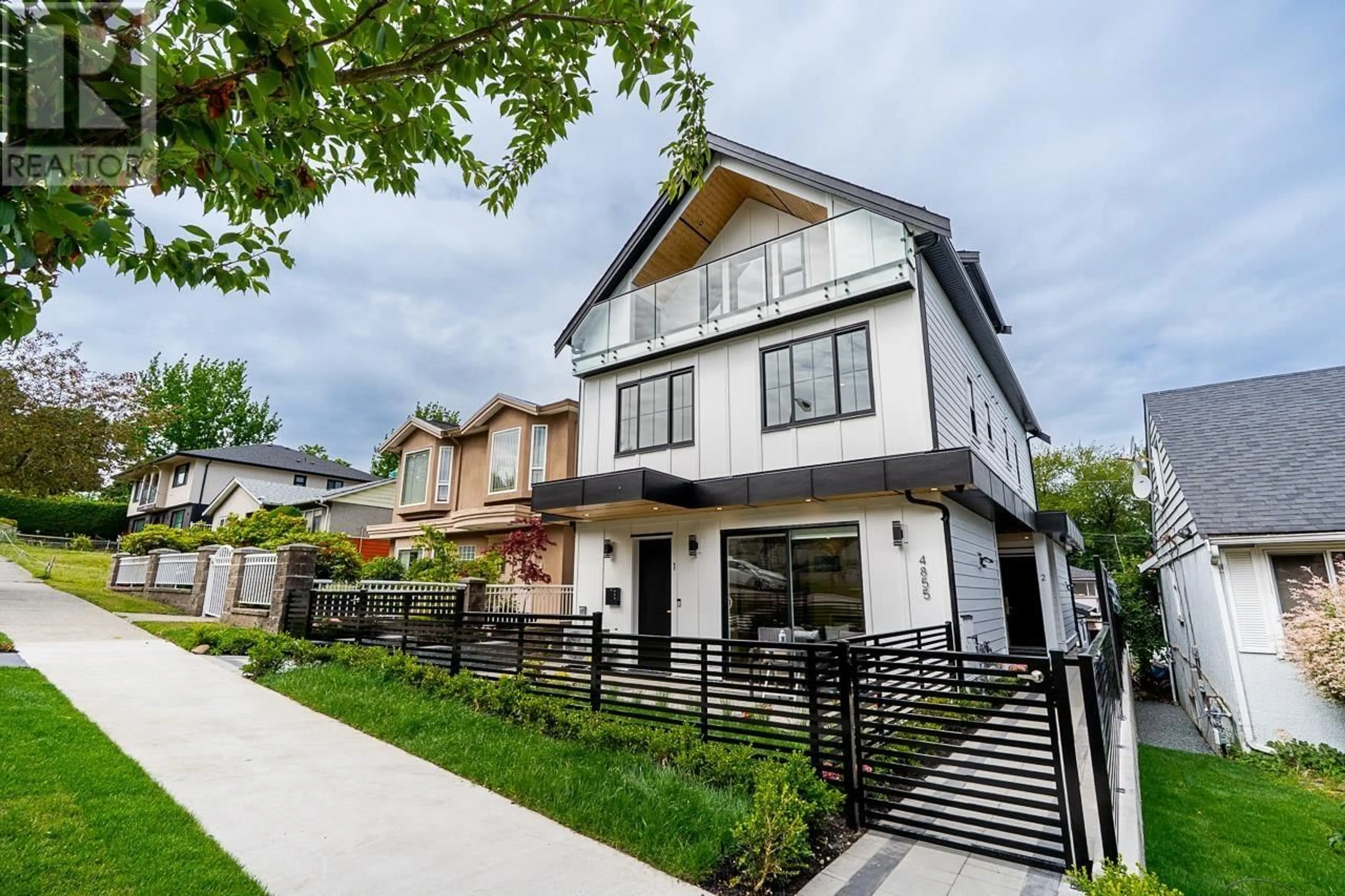 Home with brick exterior material, street for 1 - 4855 DUMFRIES STREET, Vancouver British Columbia V5N3T8